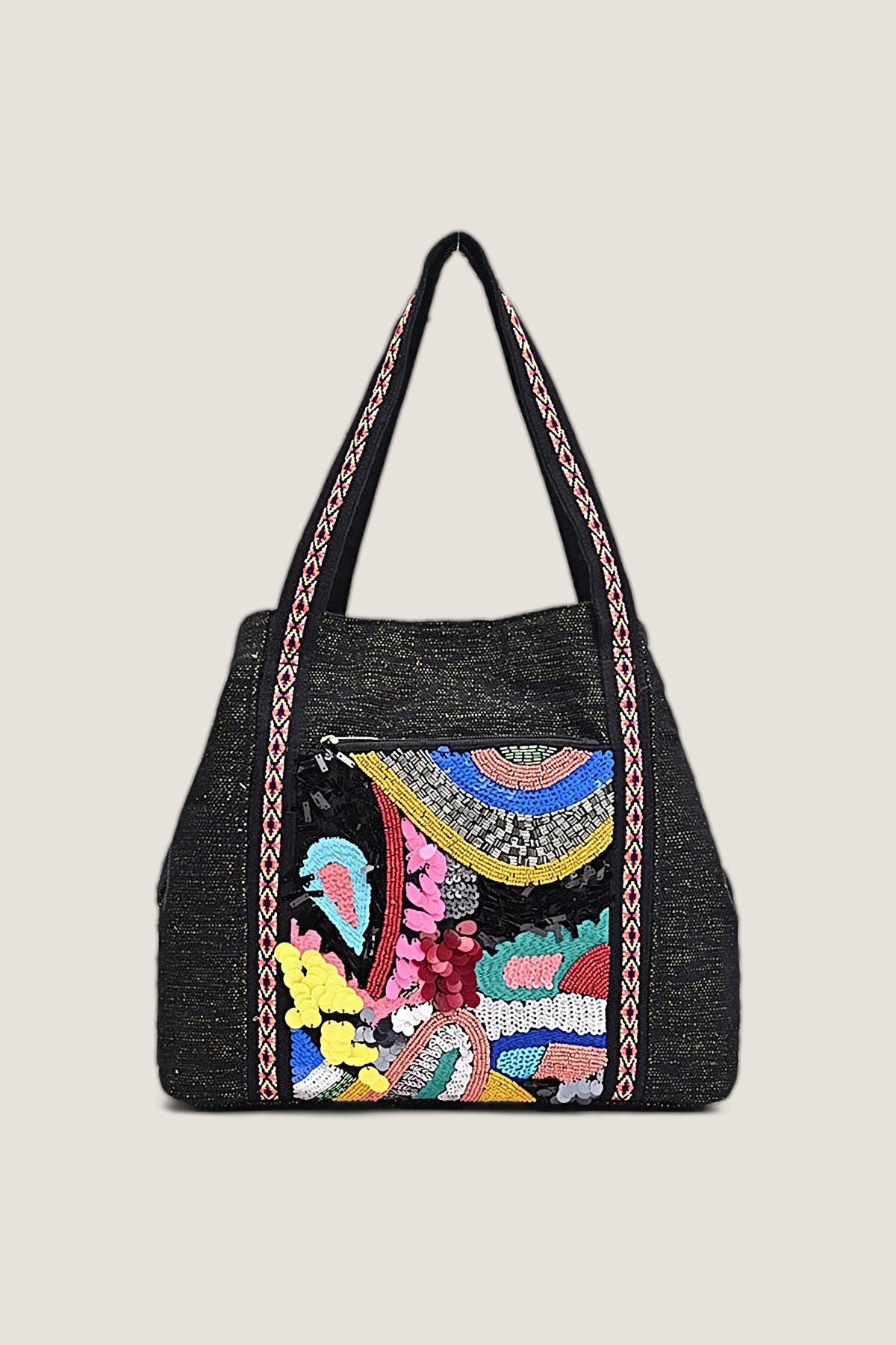 Black Triple Entry Embellished Shoulder Bag in black woven cotton with a hand beaded and sequin front panel and embroidered straps, front view on a warm greige backdrop.