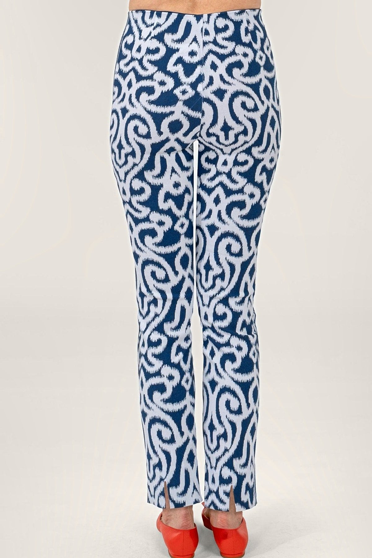 Back view of the navy arabesque print pull-on pants, showing the back ankle slits.
