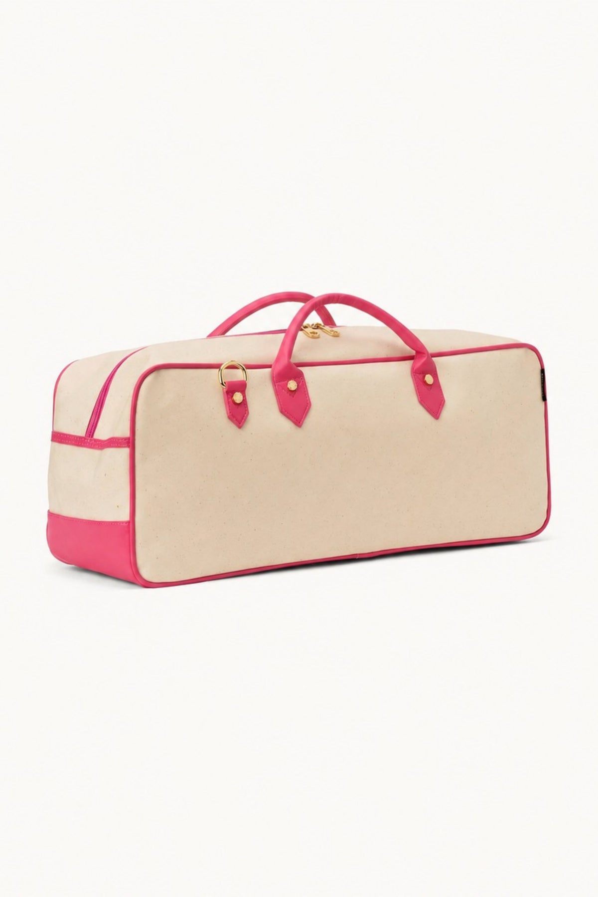 The Raspberry Margo mahjong tote at a three-quarter angle, showing its depth and hot pink base.