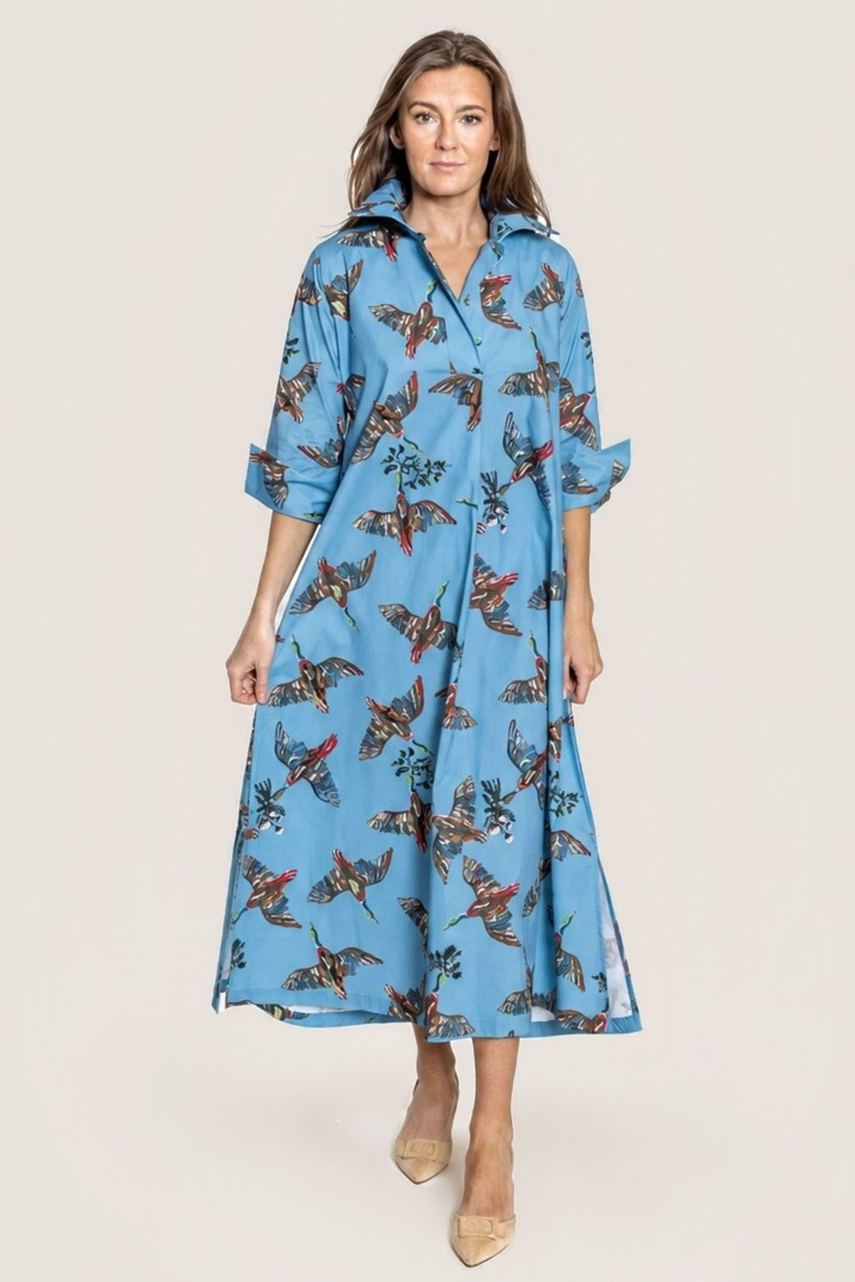 Berry Grove Ruthie blue cotton shirt dress with a colorful bird-and-branch print, button front and coordinating tie belt.