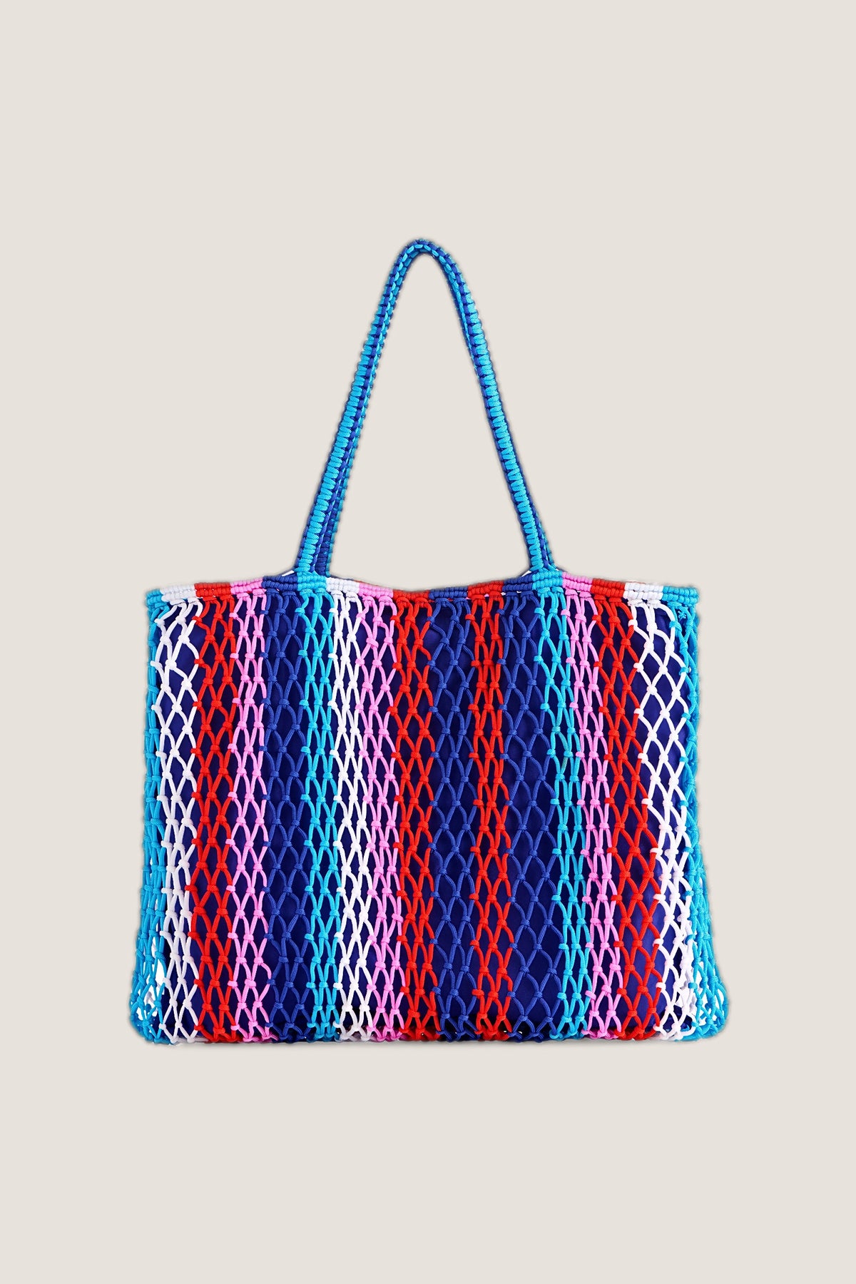 Braziliana woven stripe tote in blue, red and white, front view.