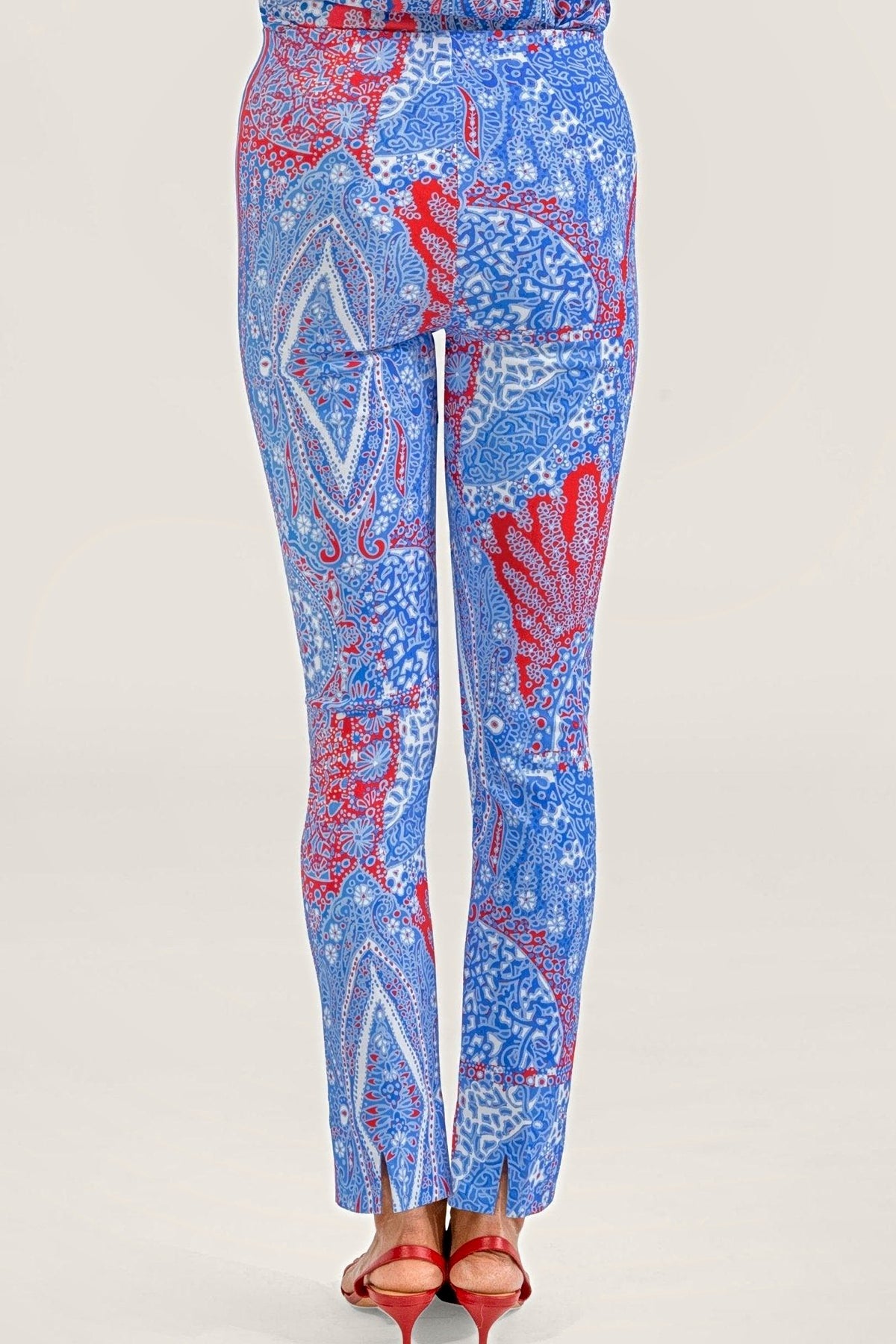 Back view of the blue and red paisley print pull-on pants, showing the back ankle slits.