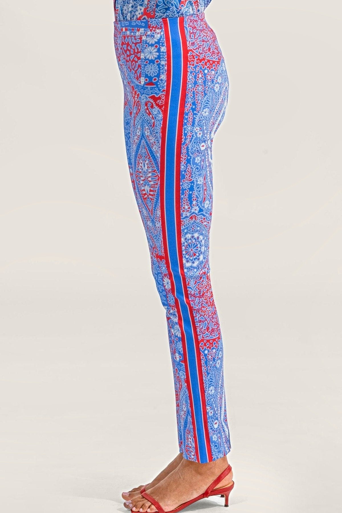 Side view of the paisley pull-on pants, showing the blue and red racer stripe side band.