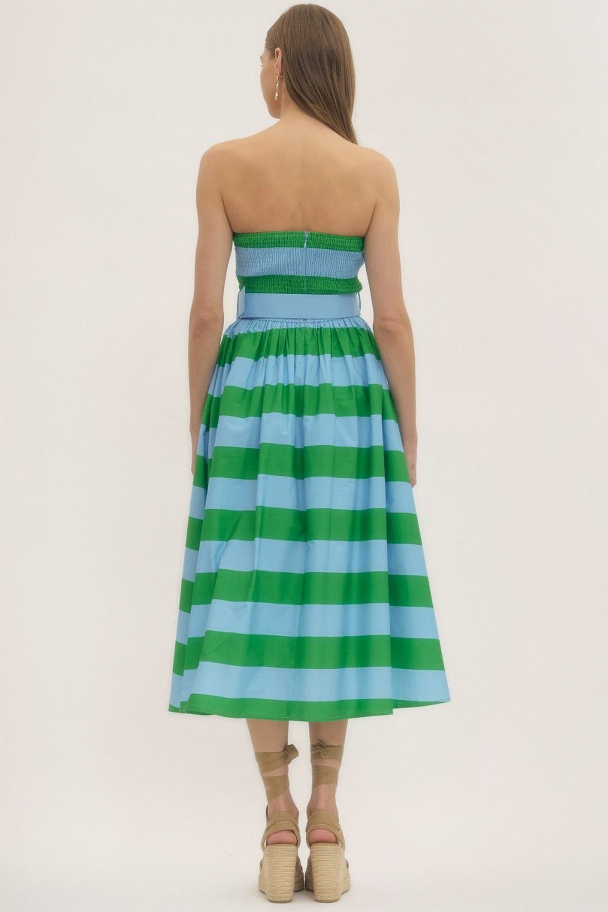 Back view of the Palm Beach striped strapless midi dress with a smocked back bodice.