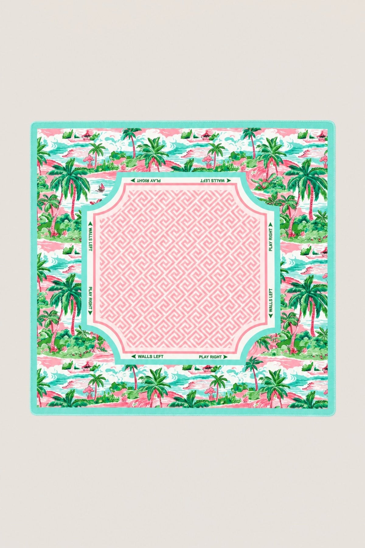 Front of a mahjong mat that has palm trees and a beach scene