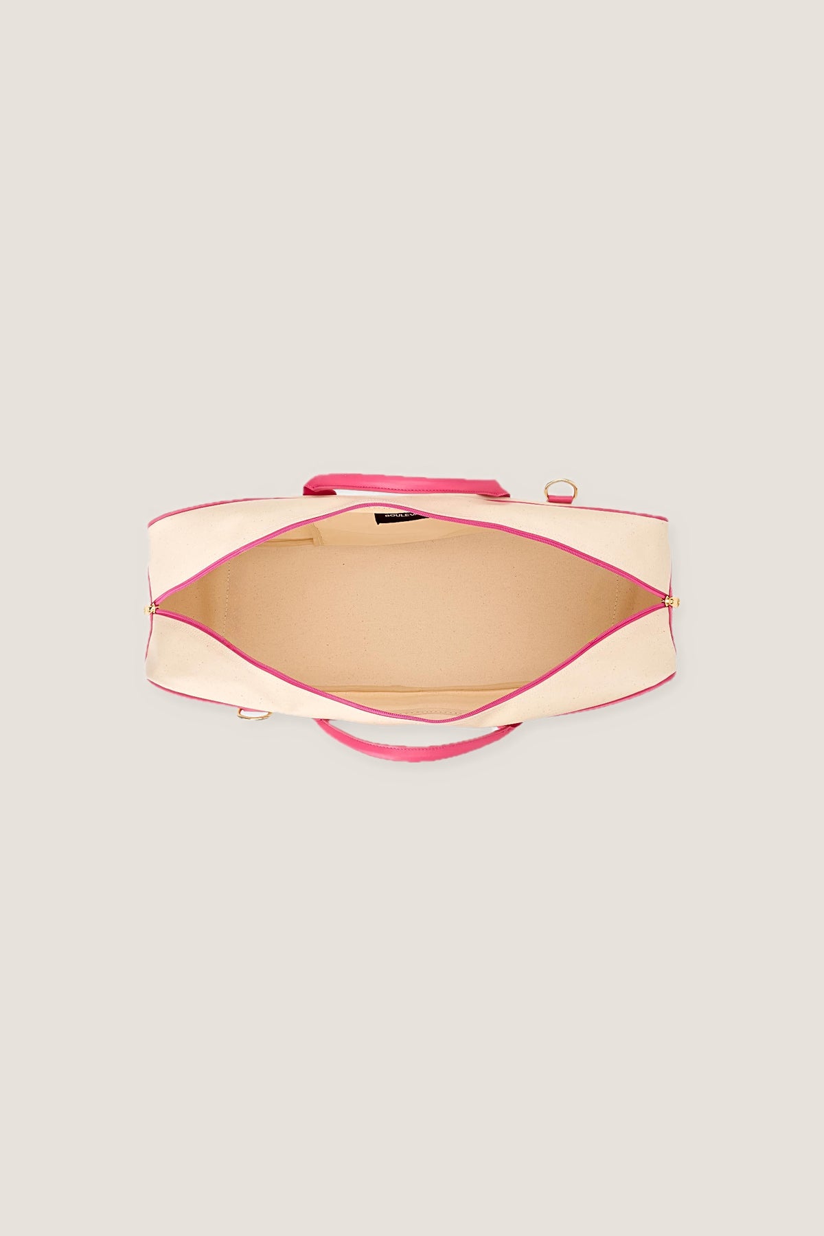 Inside the Raspberry Margo mahjong tote, unzipped from above, showing the canvas lining.