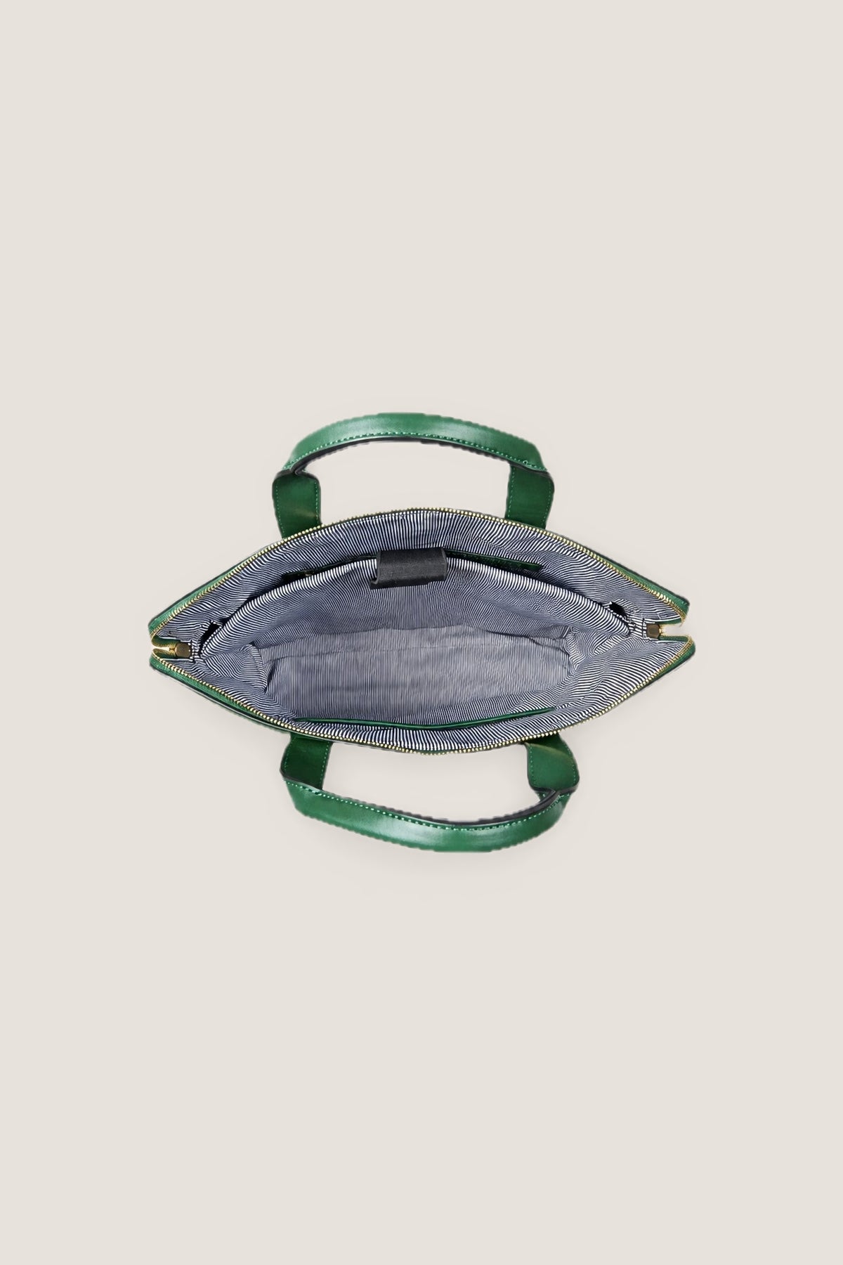 Inside the green Rhodes Laptop Bag, opened from above, showing the striped lining and padded laptop sleeve.