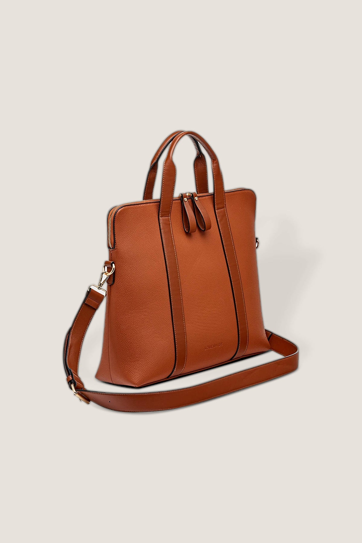 The tan Rhodes Laptop Bag at a three-quarter angle, showing its depth and adjustable strap.