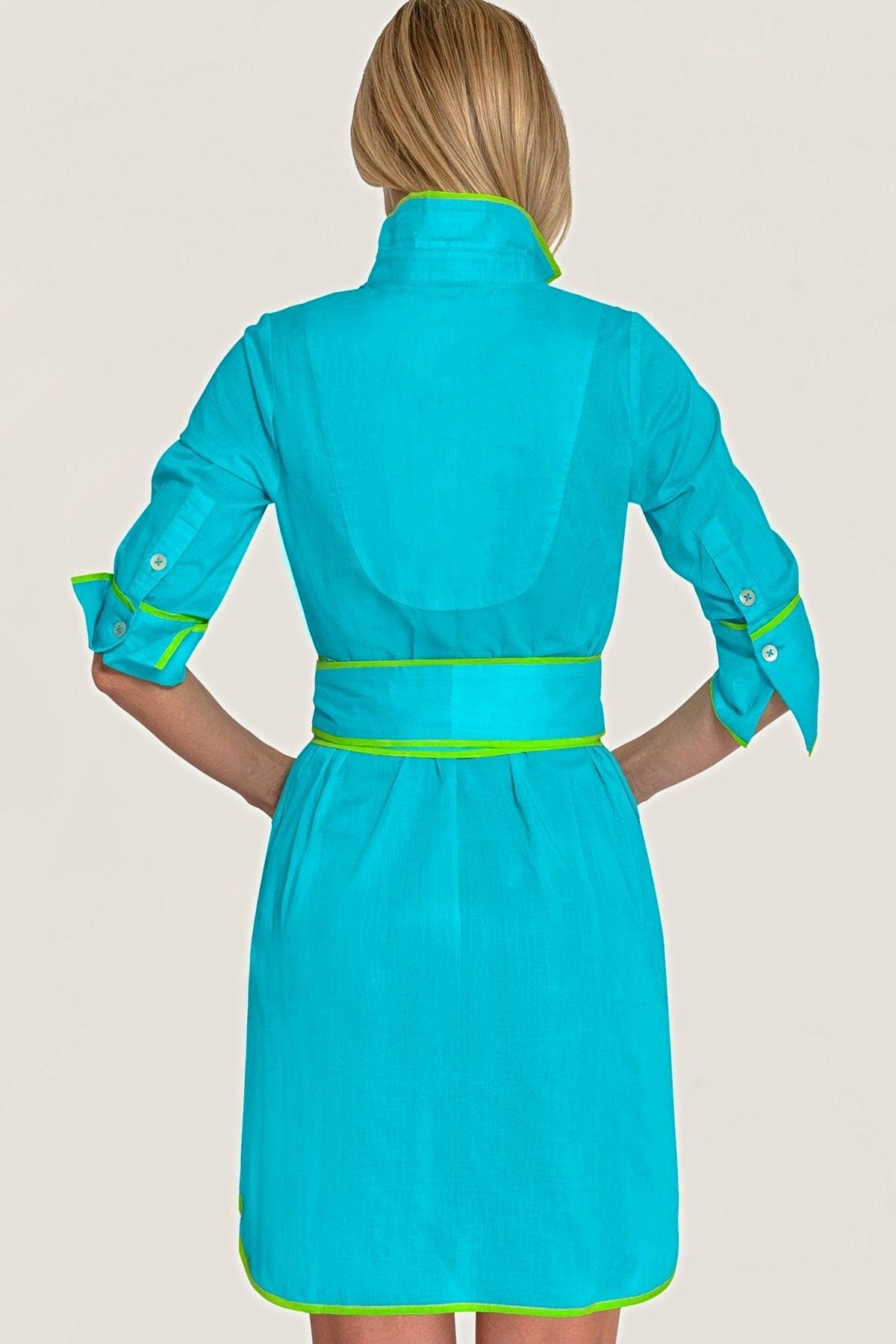 Back view of the turquoise shirt tails dress with lime piping.