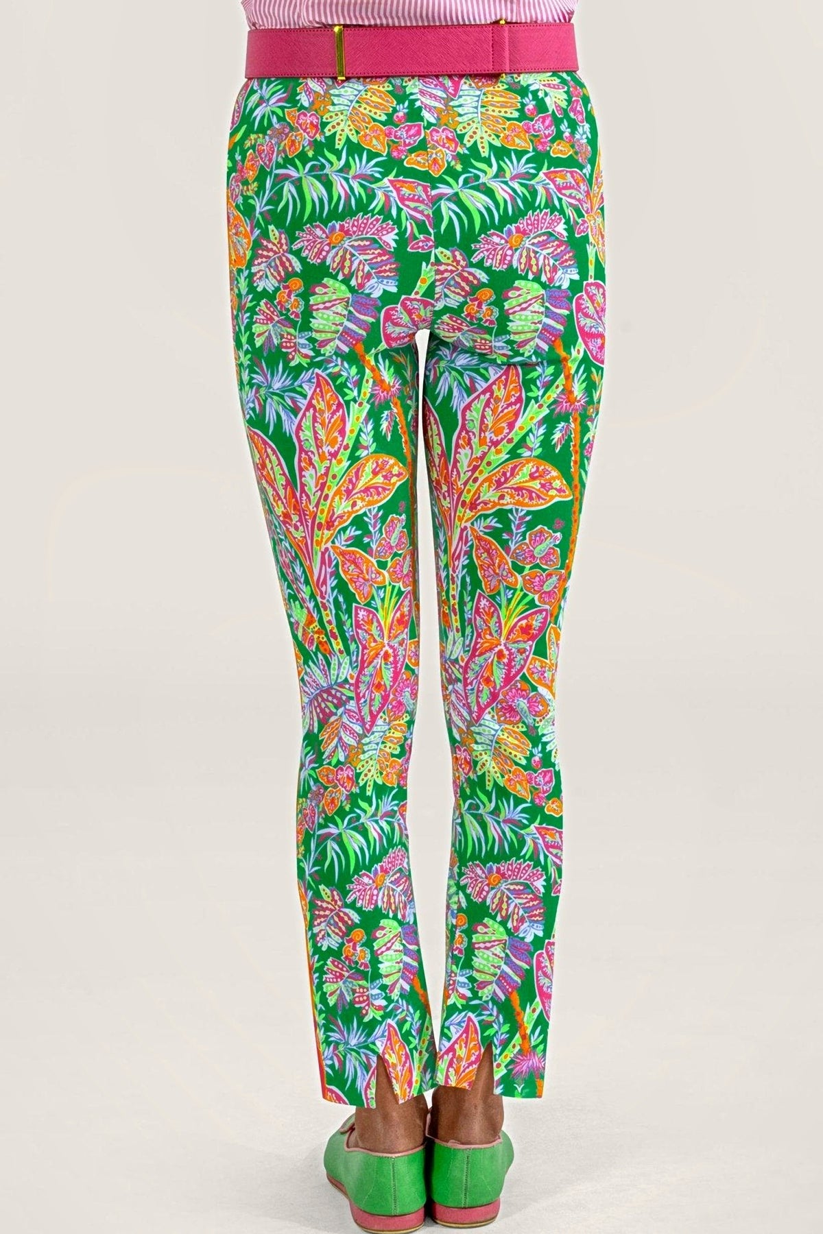 Back view of the kelly green vine print pull-on pants, showing the back ankle slits.