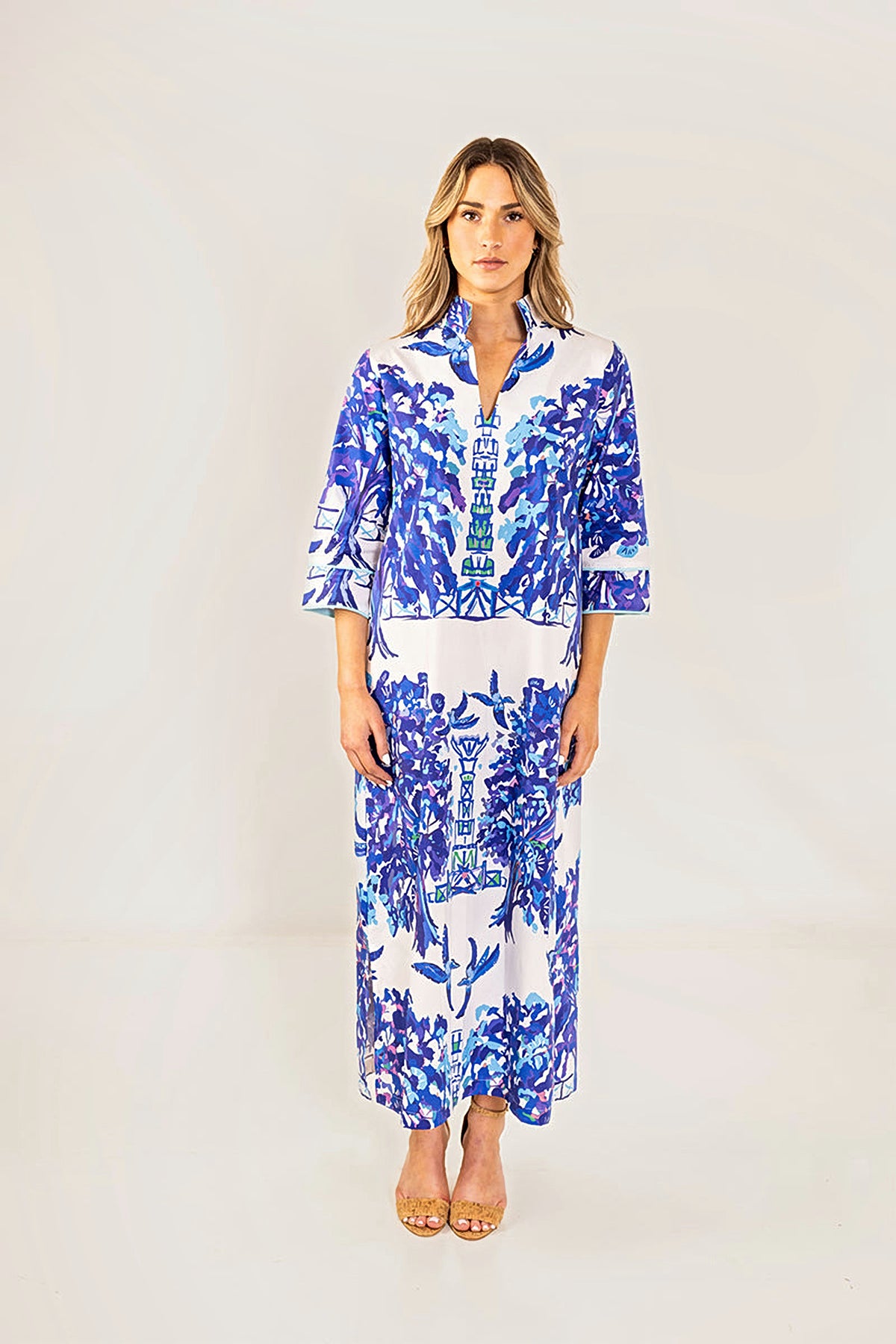 Front view of the Willow Bouvier long dress in a blue and white chinoiserie print with three-quarter sleeves.