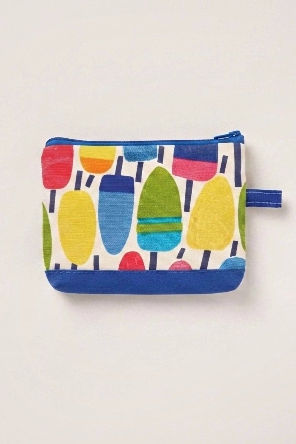 A small zippered pouch with a colorful popsicle print on a white background, featuring blue trim and a blue zipper pull, shown against a plain off-white background.