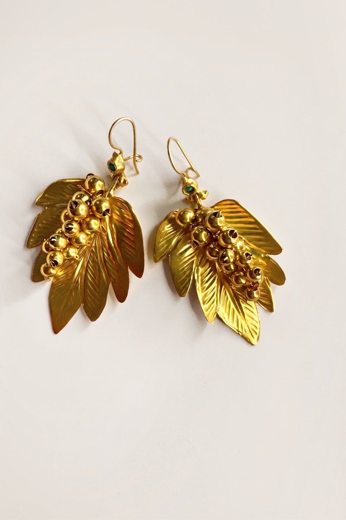 Gabriella Leaf Earrings on a cream background