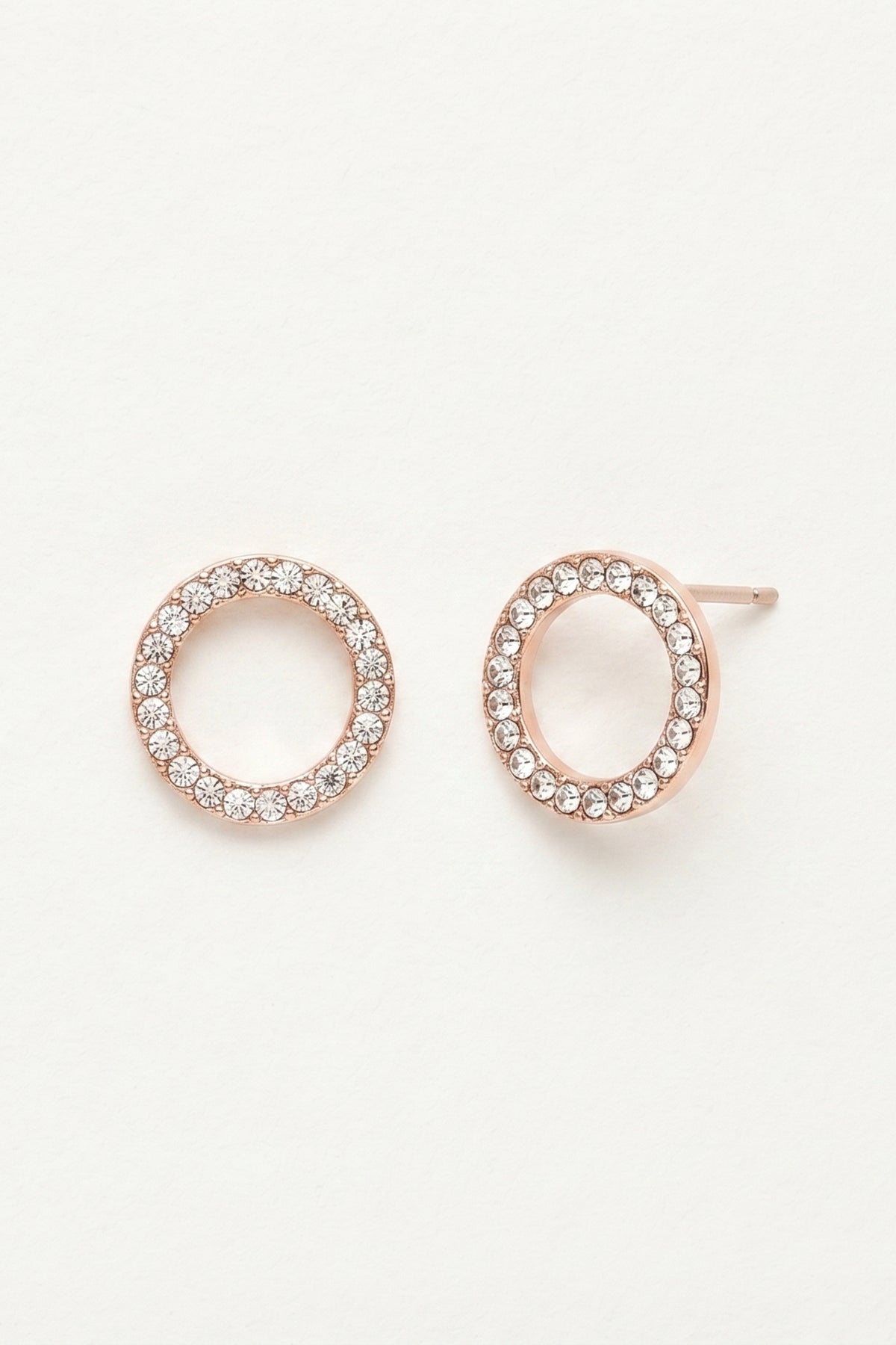 Gold Crystal Eternity Stud Earrings on a cream background