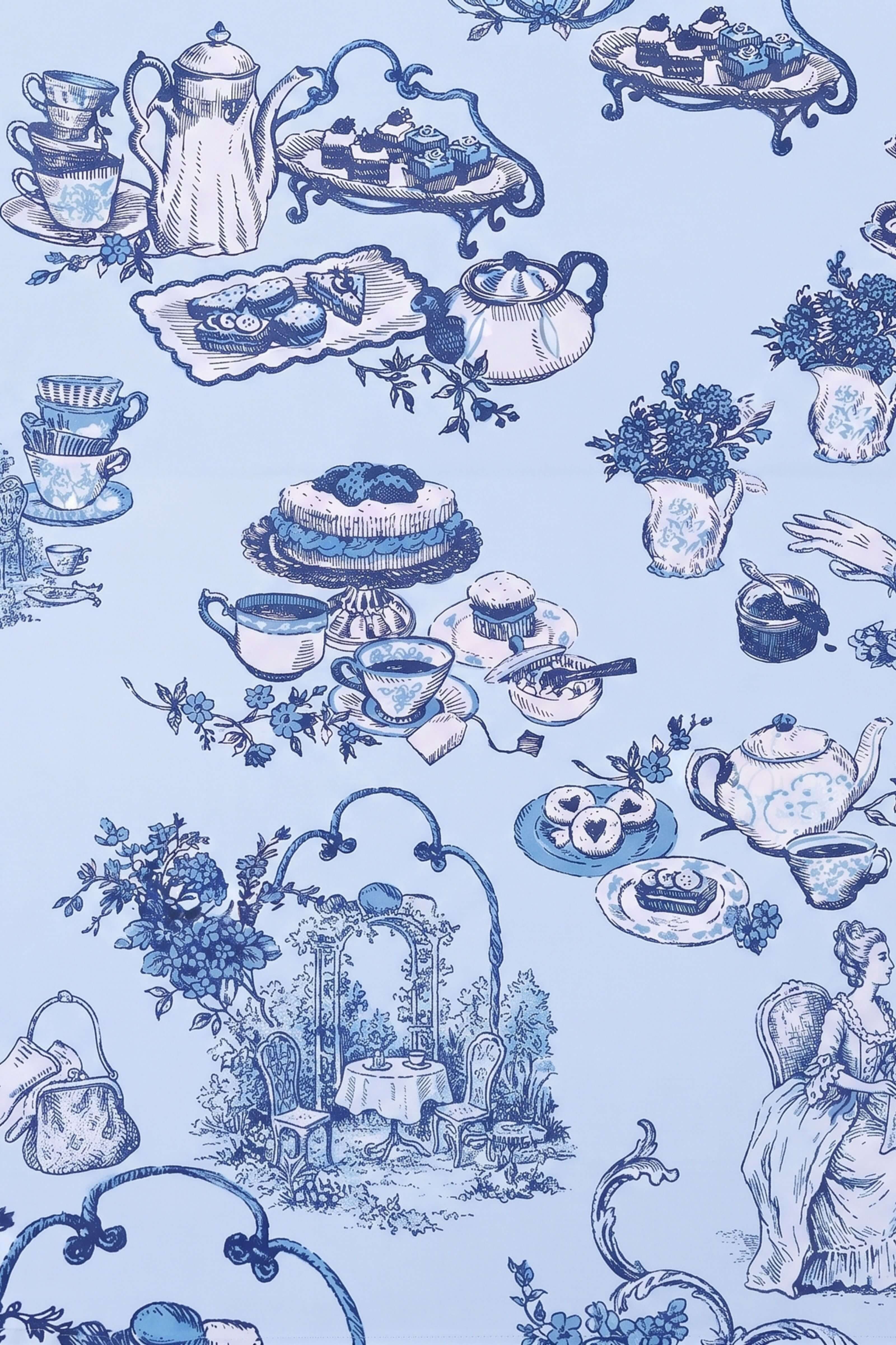 Light blue fabric or wallpaper featuring a repeating blue toile-style pattern of teapots, teacups, cakes, flowers, and a seated woman.