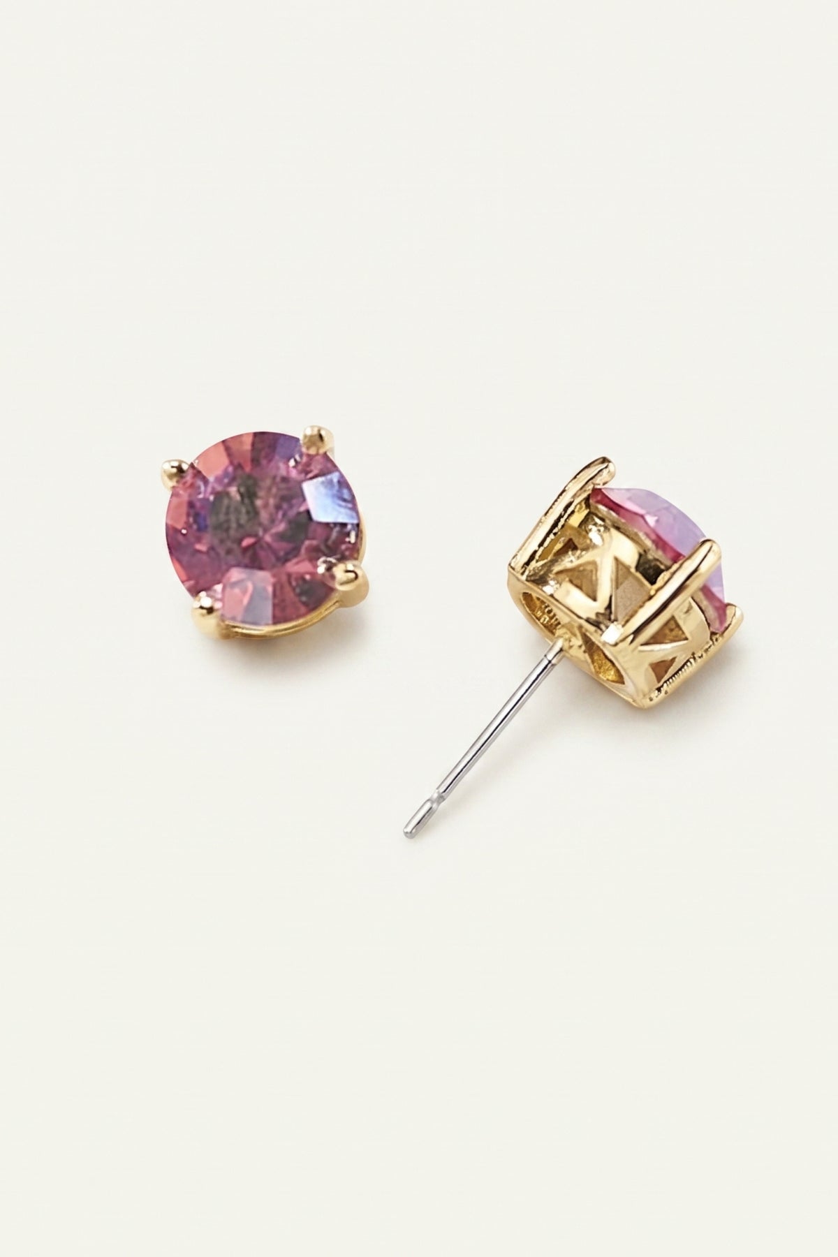 Iridescent Coral Sparkle Stud Earrings on a cream background
