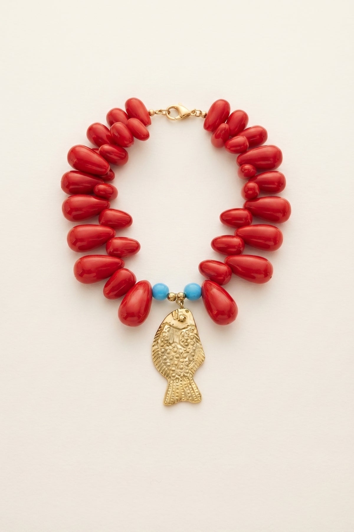 Lucky Fish Kitsch & Sea Resin Bead Necklace on a cream background