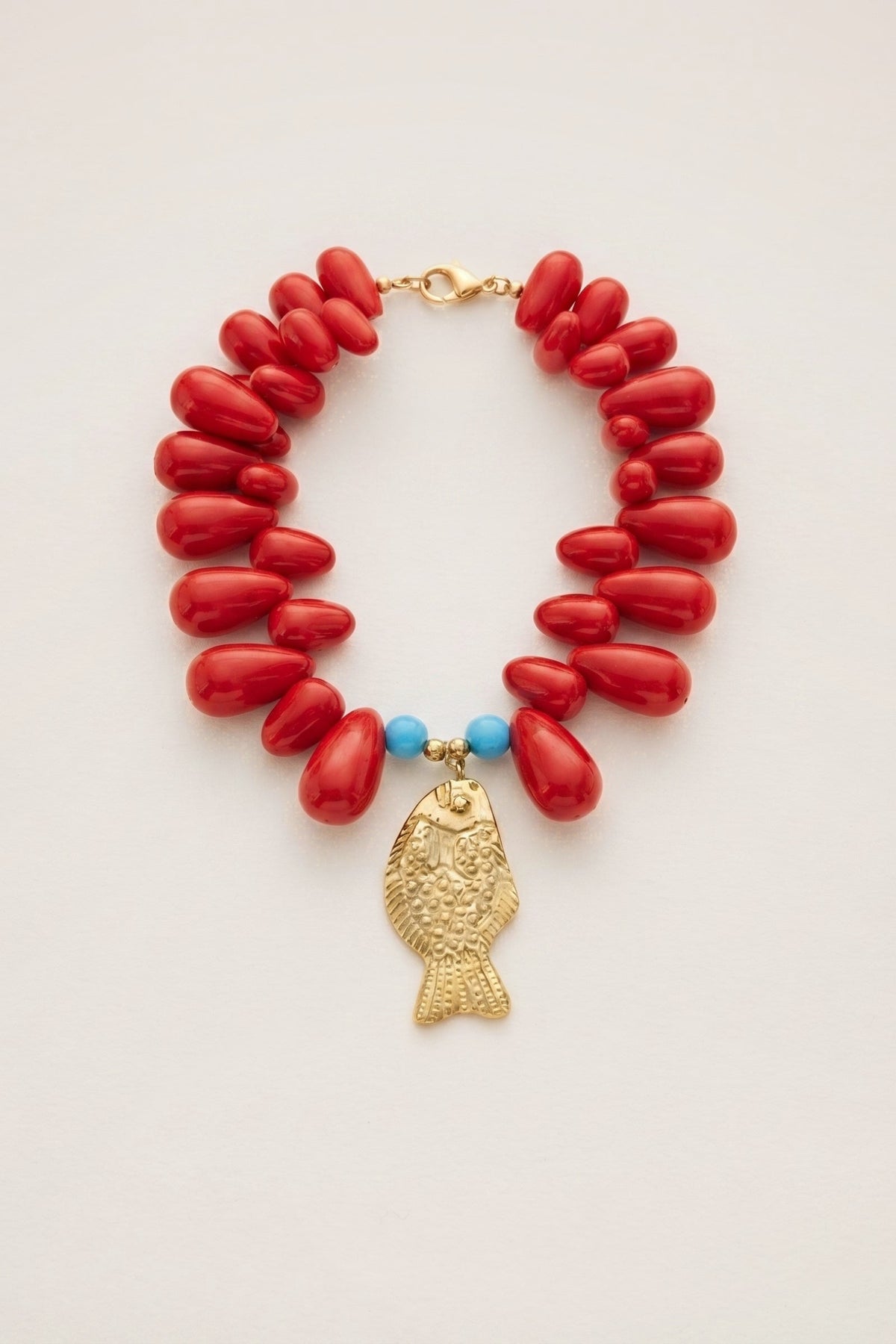 Lucky Fish Kitsch & Sea Resin Bead Necklace on a cream background