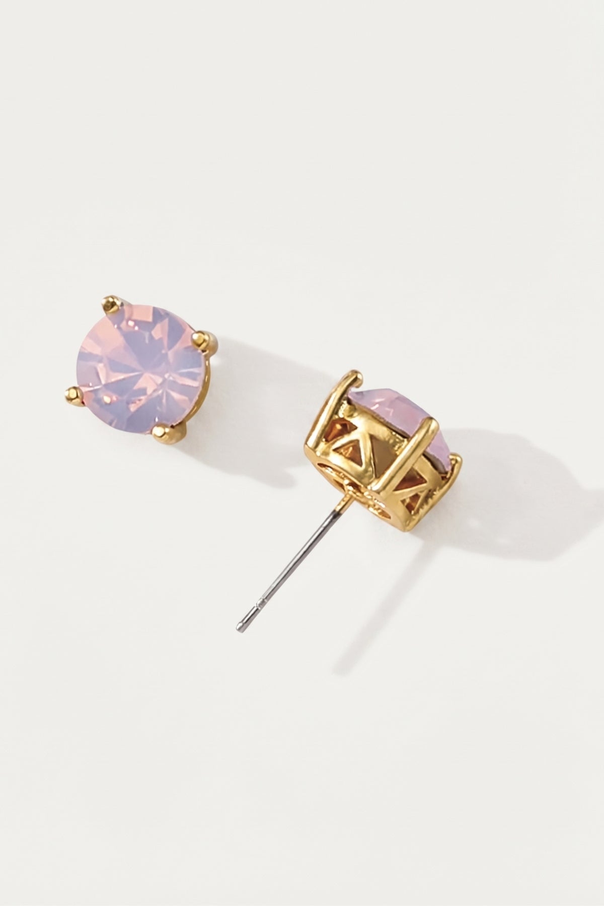 Pink Opal Sparkle Stud Earrings on a cream background