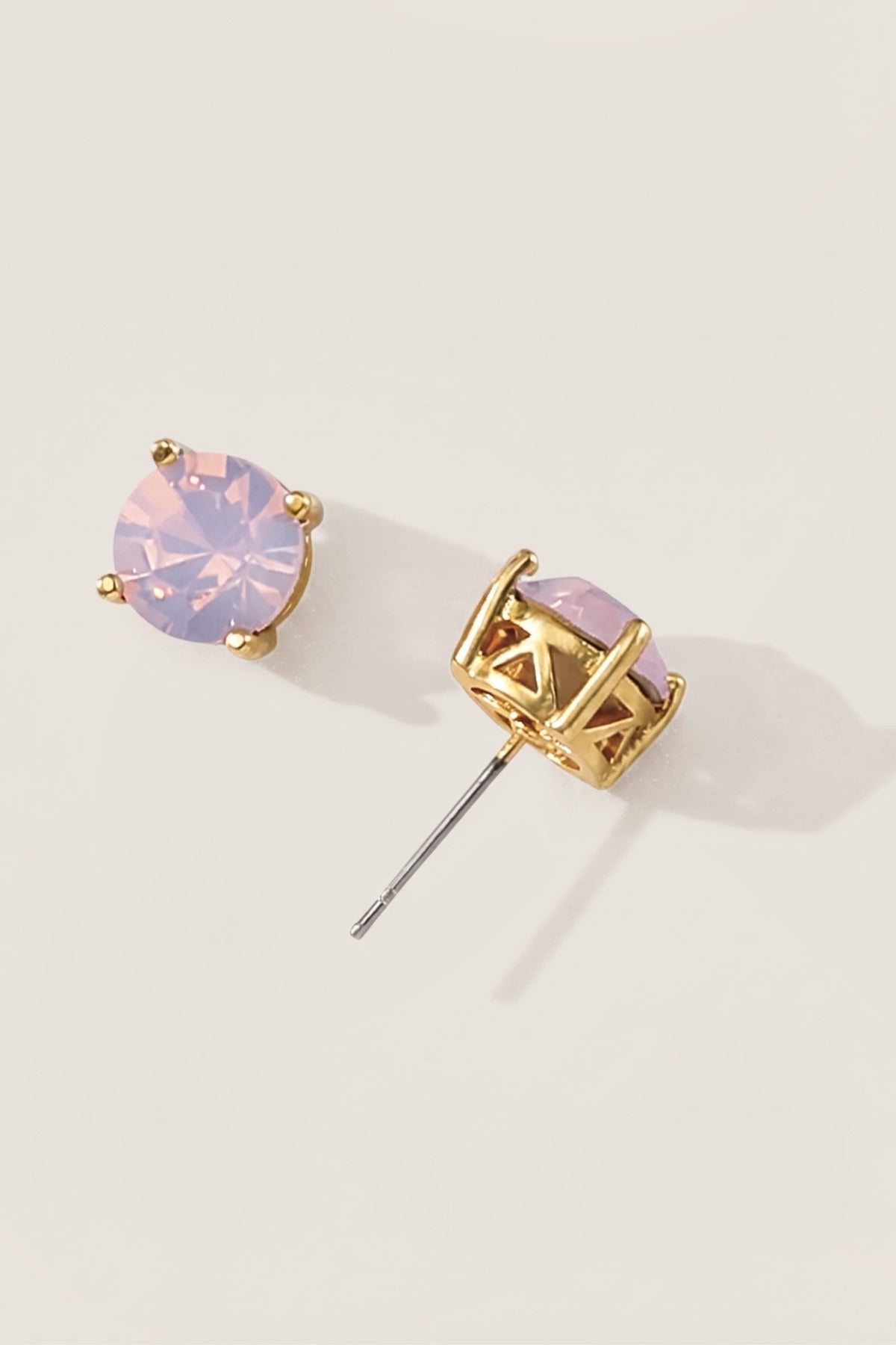 Pink Opal Sparkle Stud Earrings on a cream background