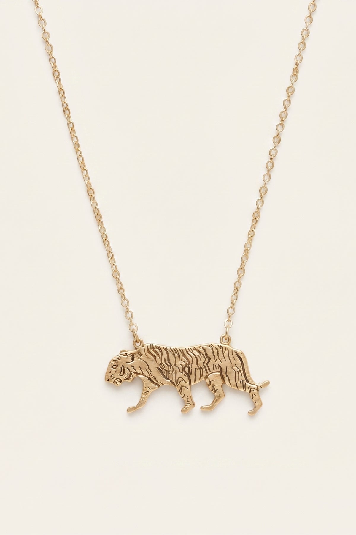 Tiger Necklace on a cream background
