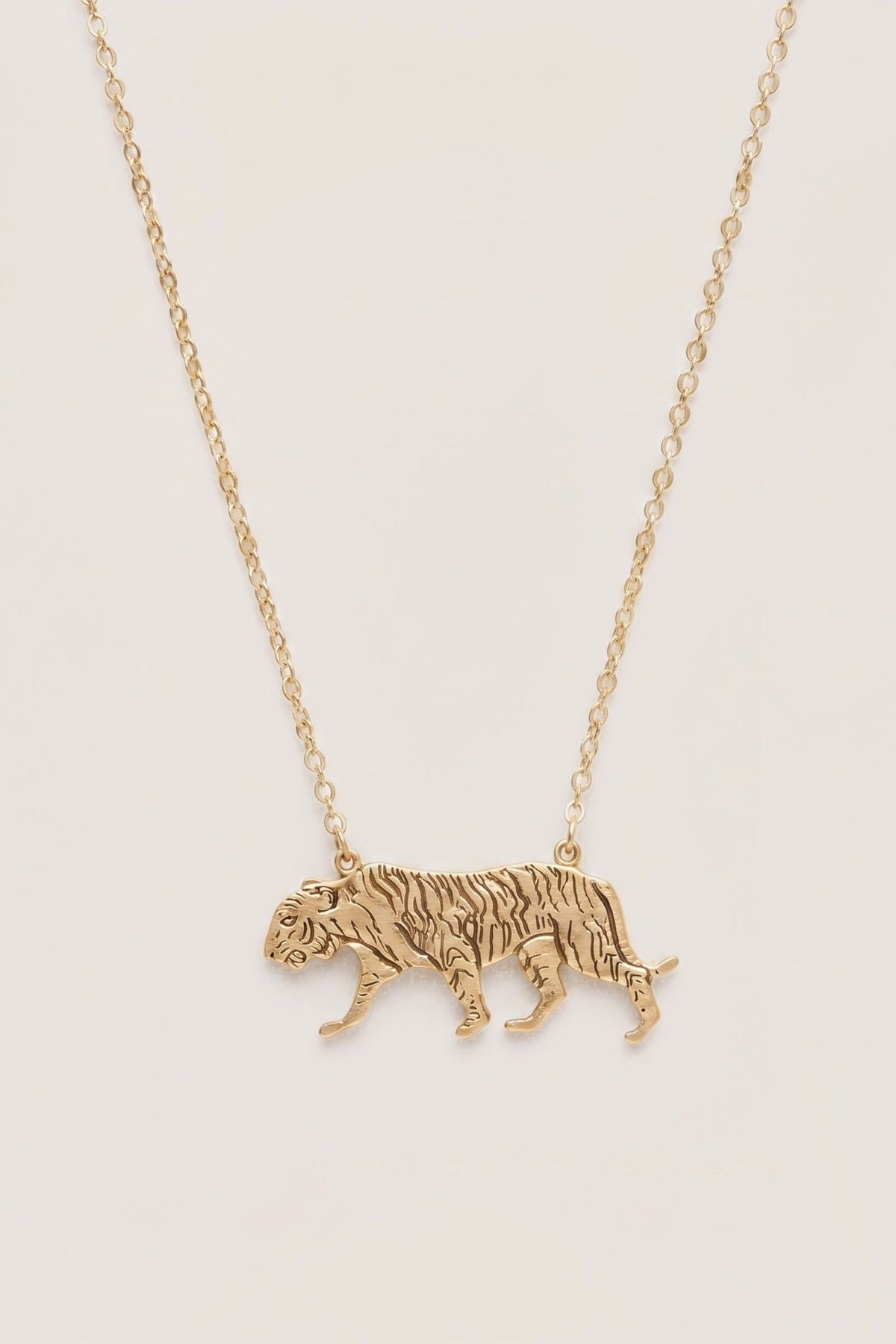 Tiger Necklace on a cream background