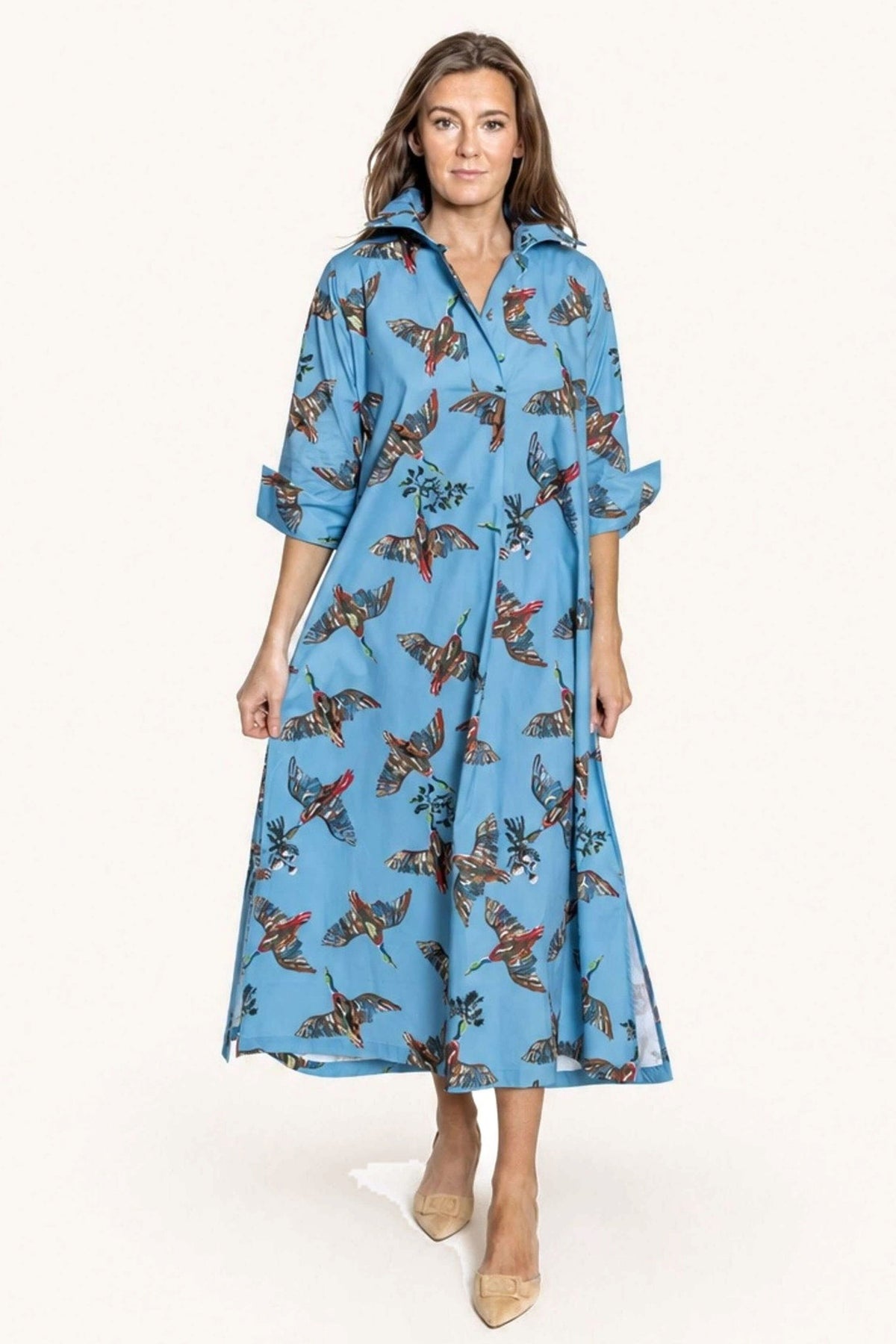 Berry Grove Ruthie blue cotton shirt dress with a colorful bird-and-branch print, button front and coordinating tie belt.