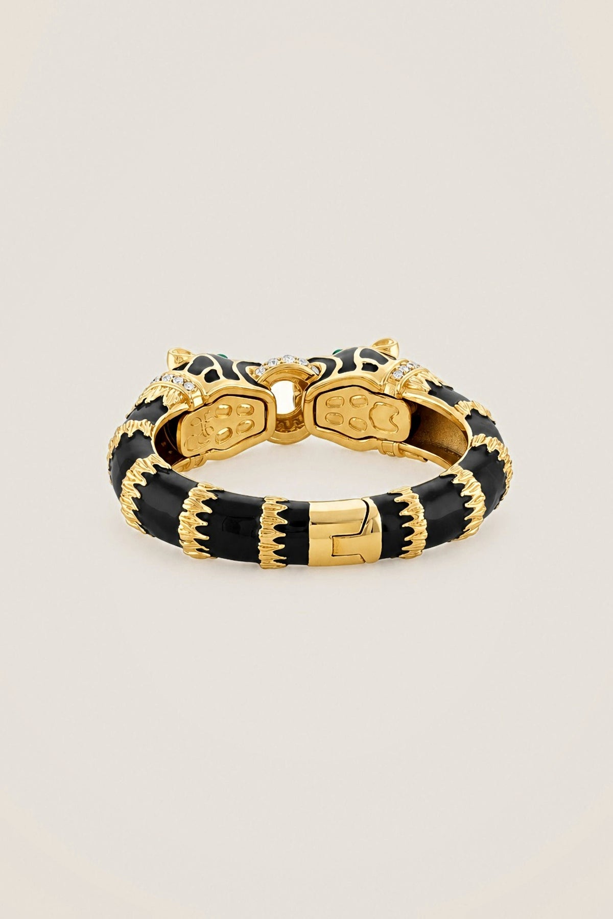 Back of the Black Enamel Double Panther Bracelet, showing the hinge and the gold detailing between the enamel bands.