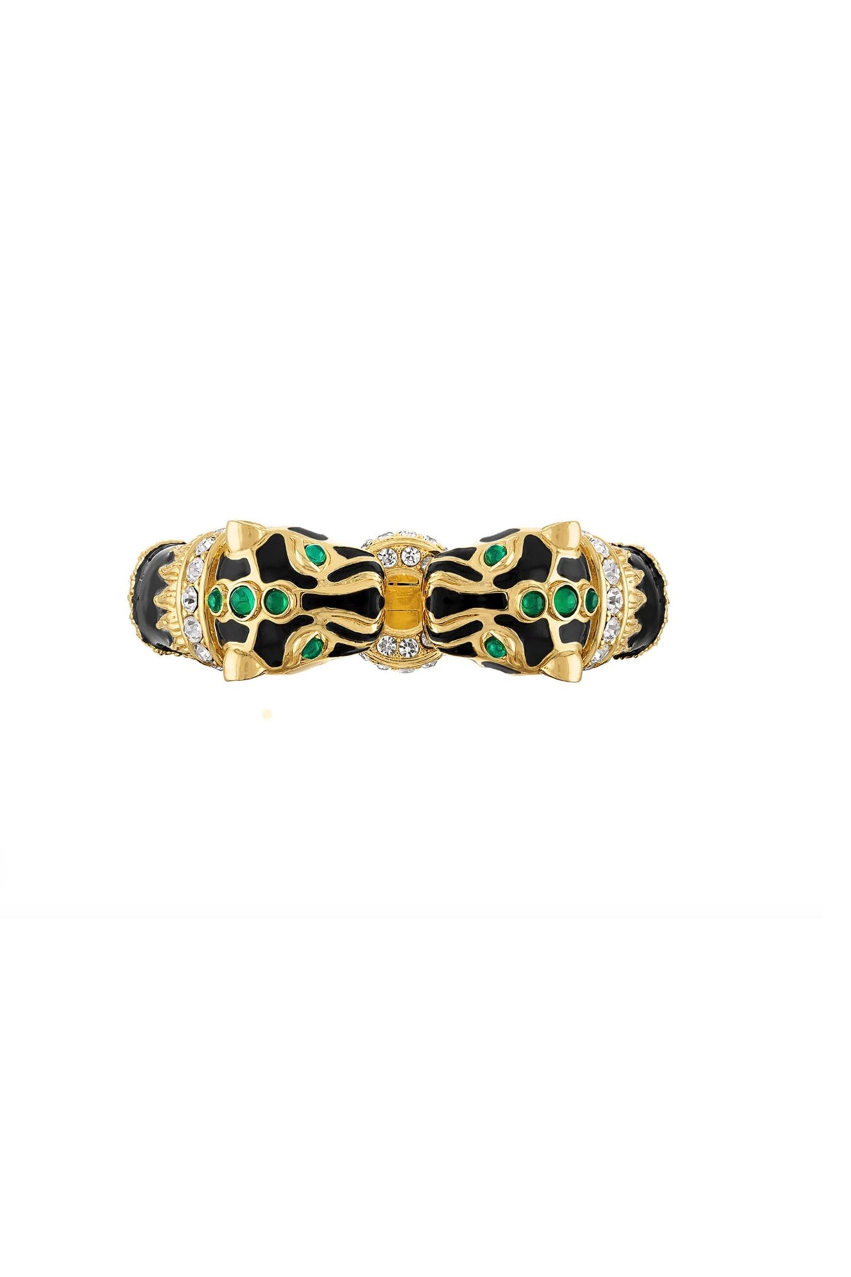 A gold-toned bangle bracelet featuring a bow design with black enamel, green stone accents, and small clear rhinestones, shown against a plain white background.