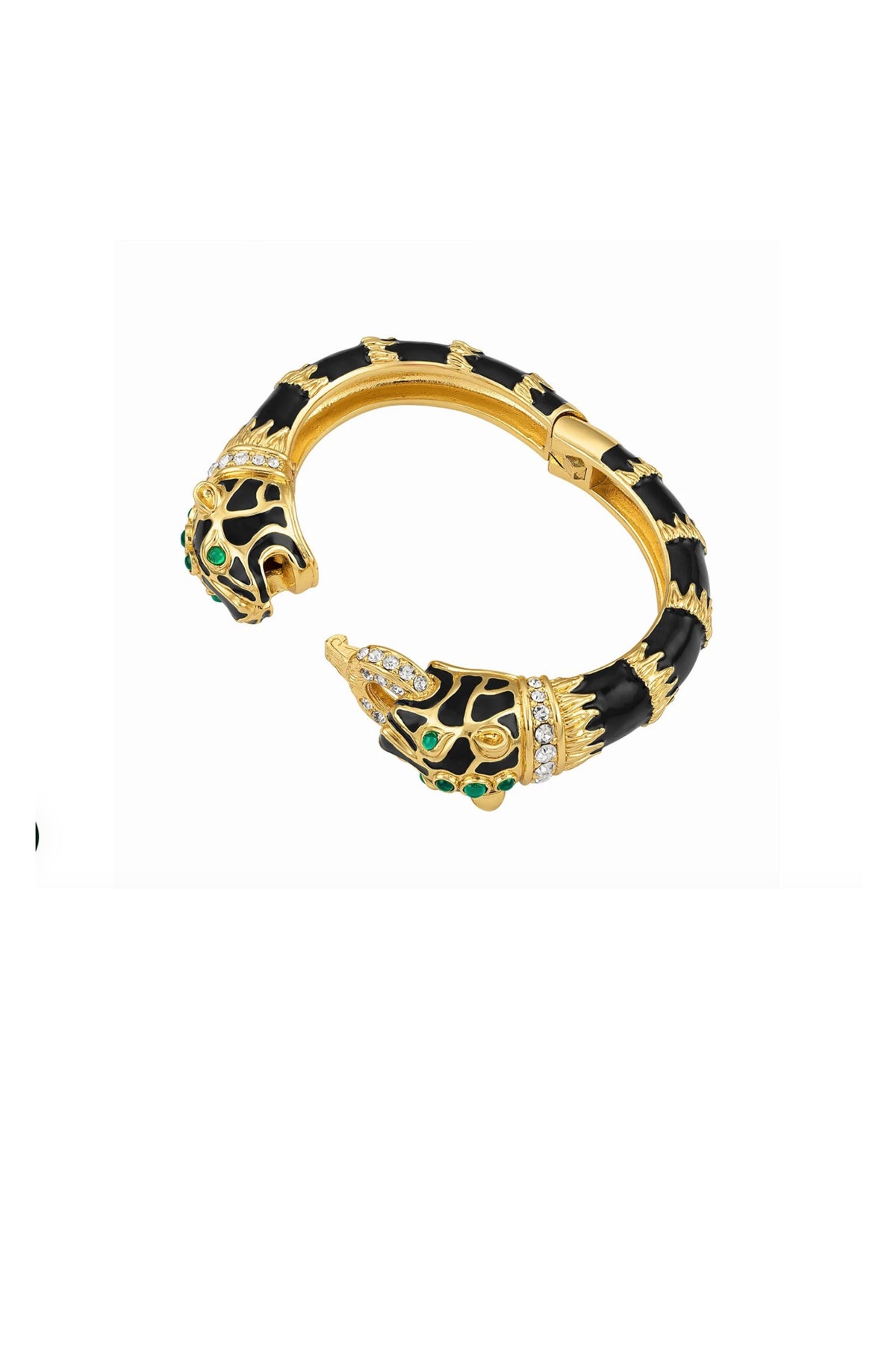 A gold-plated cuff bracelet featuring black enamel panels, green and white stone accents, and a stylized animal head motif at each end, shown on a plain white background.