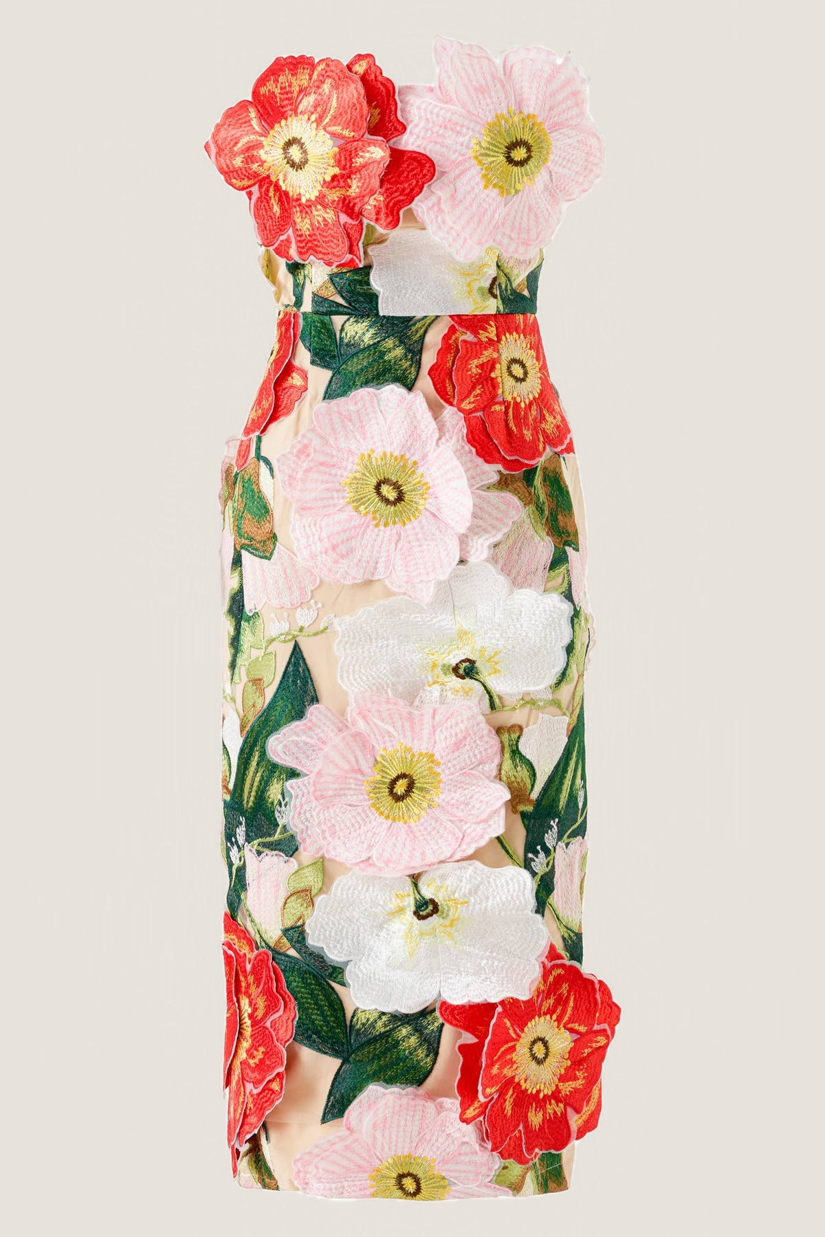 The Camellia Garden embroidered strapless midi dress shown alone from the front on a warm neutral background, with raised coral, pink and white embroidered flowers and green leaves.