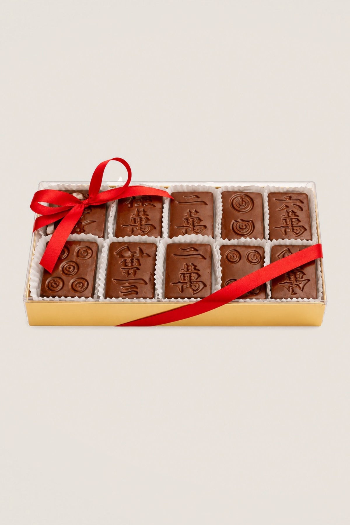 A box of chocolate mahjong tiles in milk chocolate