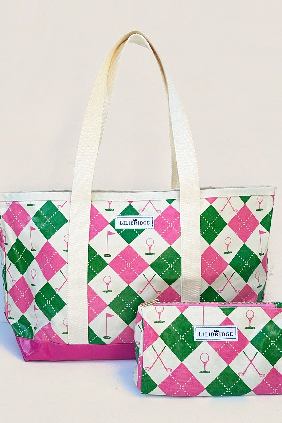 The Forevermore golf tote in pink and green argyle from the front, with the matching makeup bag.