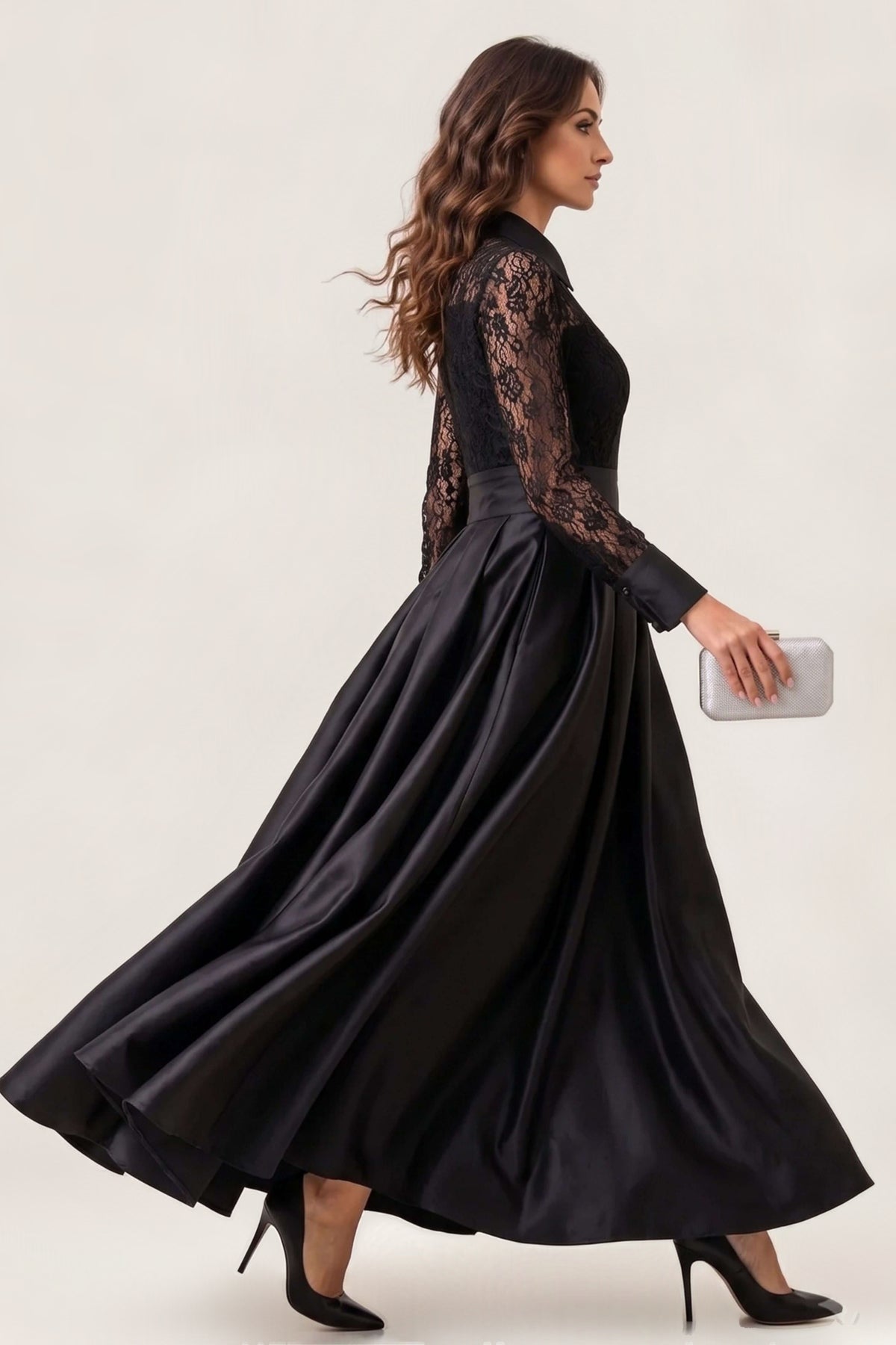 woman in black flowing dress from side 