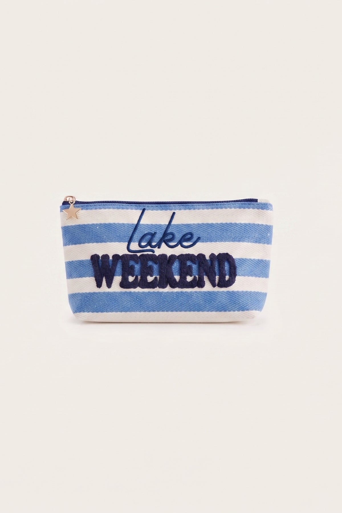 The Morgan "Lake Weekend" zip pouch in blue and white stripes with navy embroidered lettering, shown from the front.