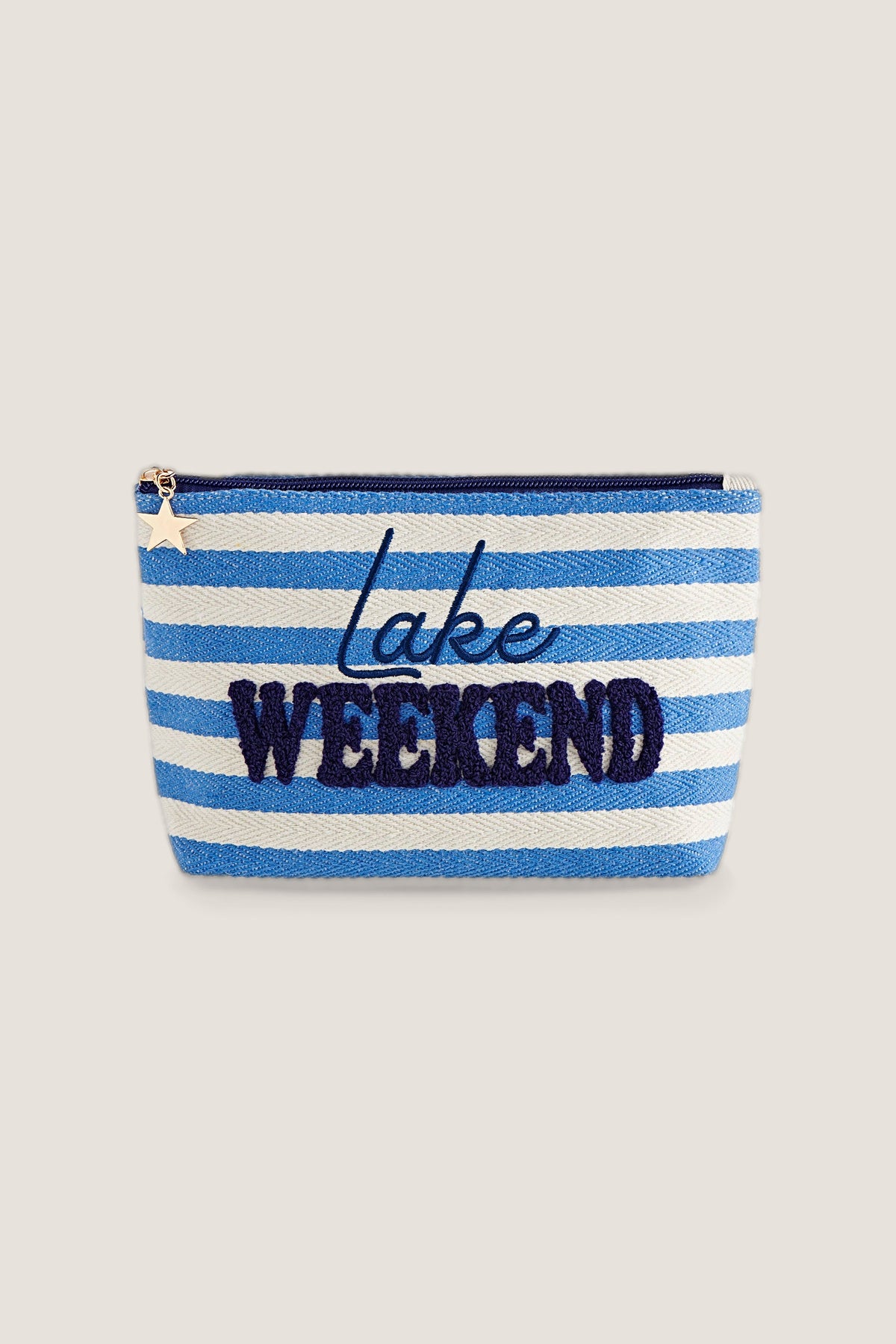 Morgan Lake Weekend large zip pouch in blue and white stripes with navy embroidered lettering, front view.