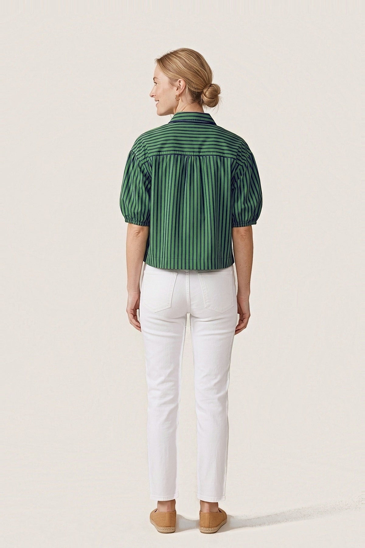 Back view of the Preppy navy and green stripe top with a gathered shoulder yoke and balloon sleeves.
