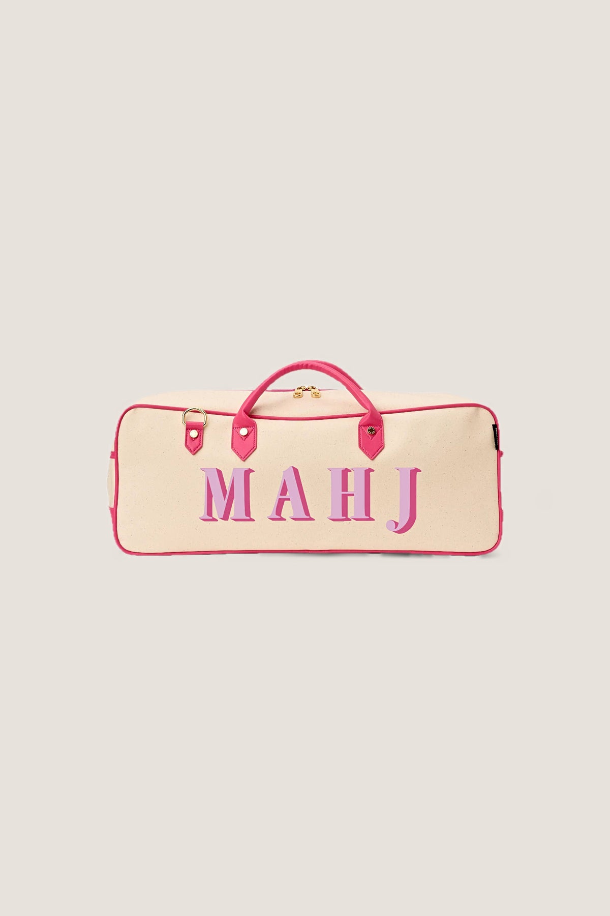 The Raspberry Margo mahjong tote in natural canvas with hot pink trim and pink MAHJ lettering, front view.