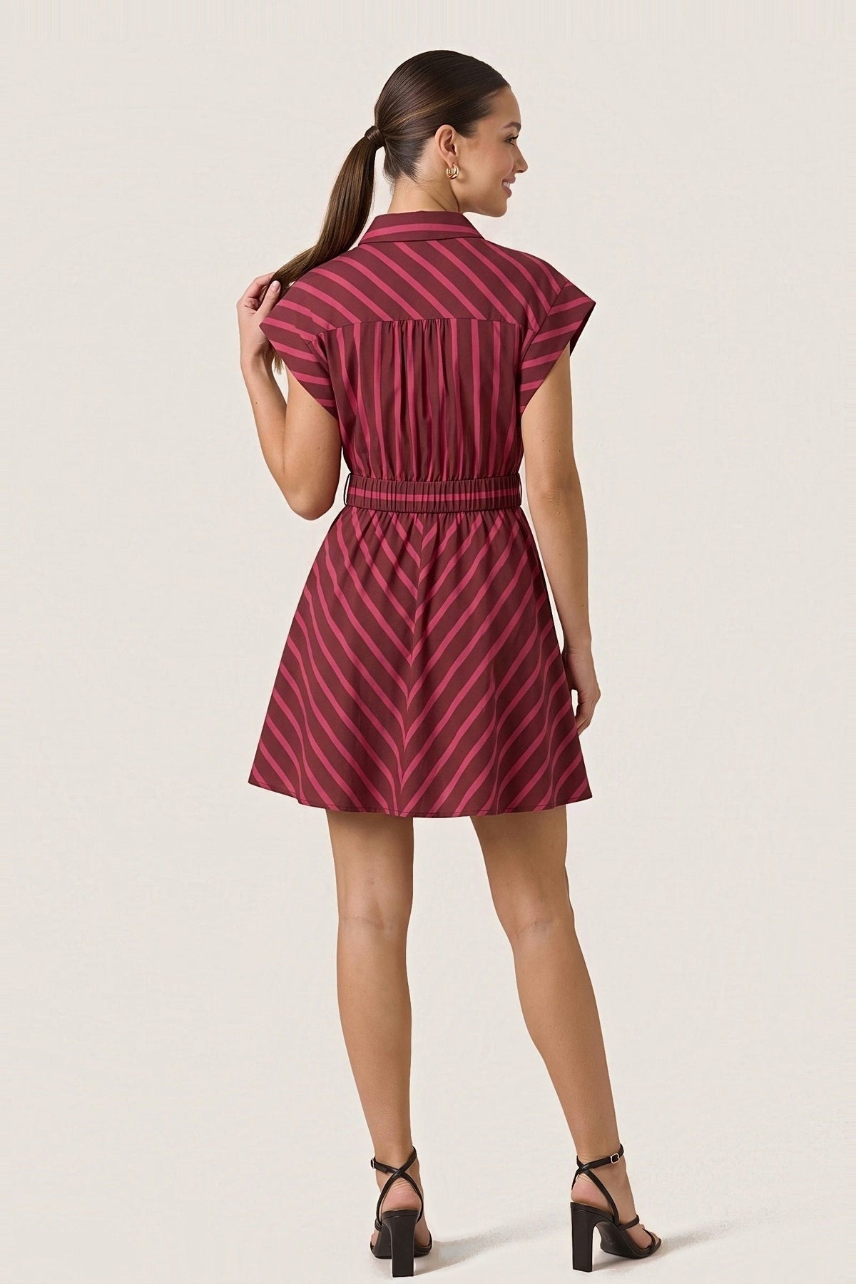 Back view of the Raspberry Ribbon striped mini dress with a gathered shoulder yoke and elastic back waist.