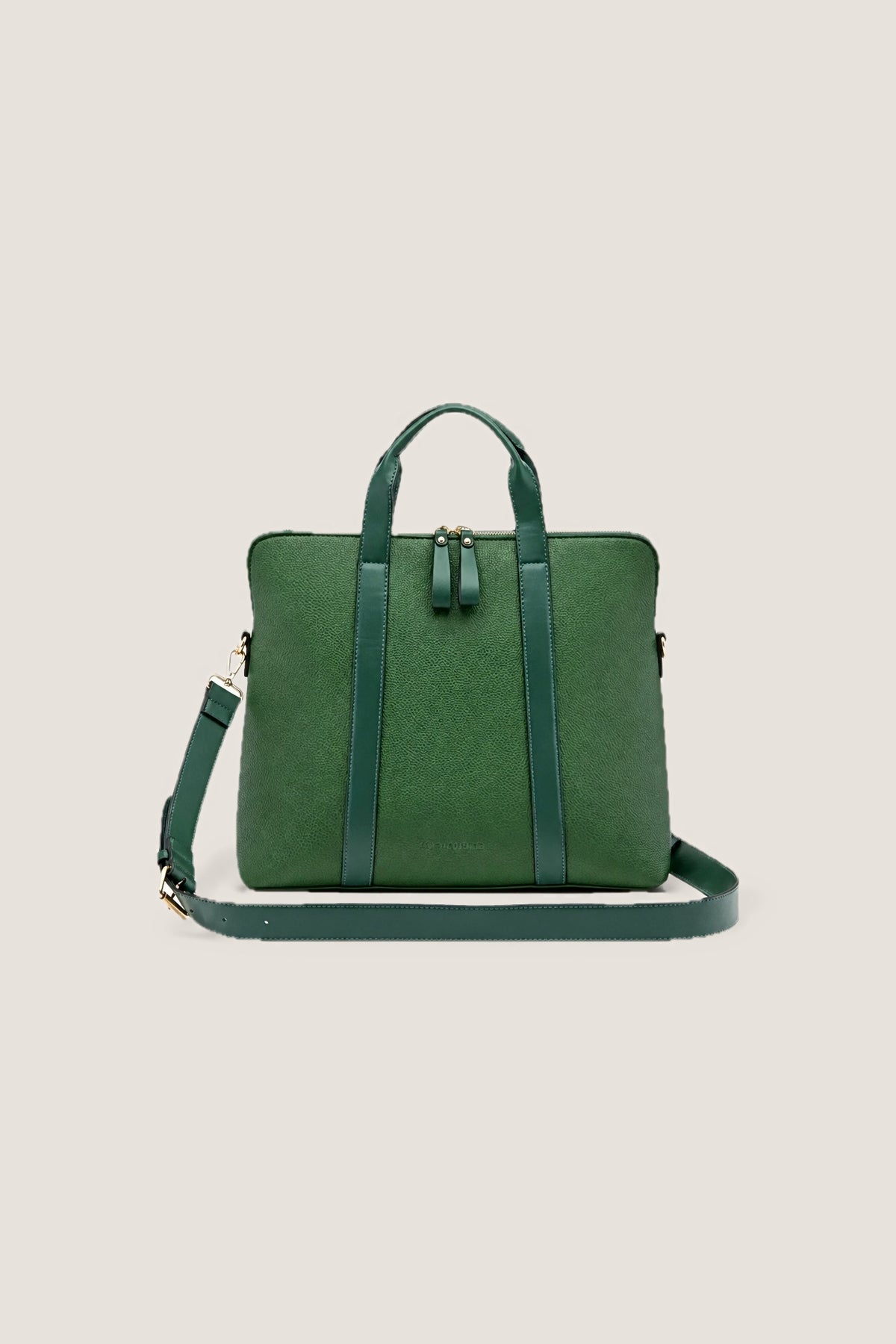 The green Rhodes Laptop Bag from the front with its long strap draped in front.
