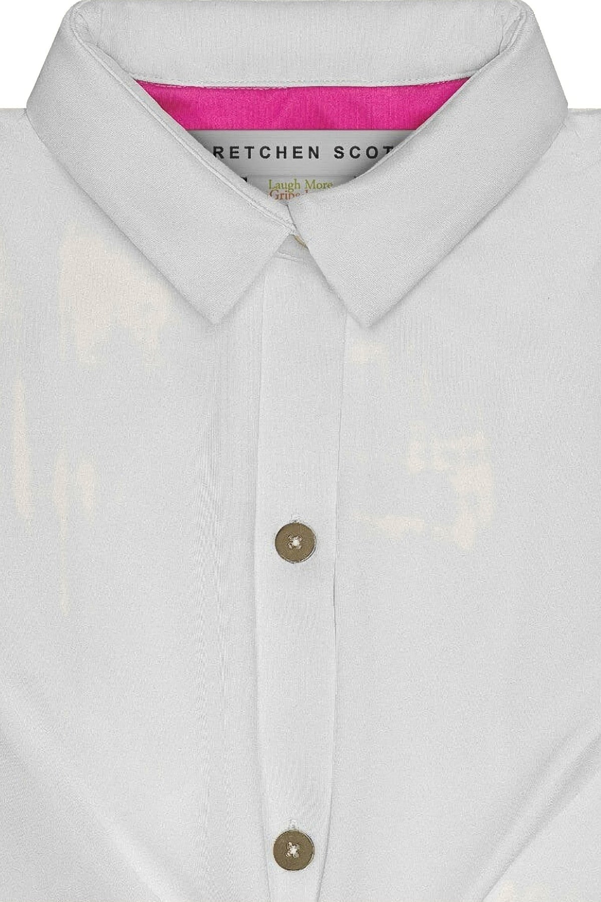 Close-up of a white shirt with a collar and buttons on a white background