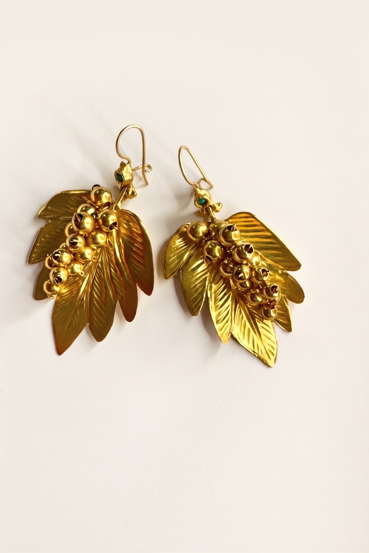 Gabriella Leaf Earrings on a cream background