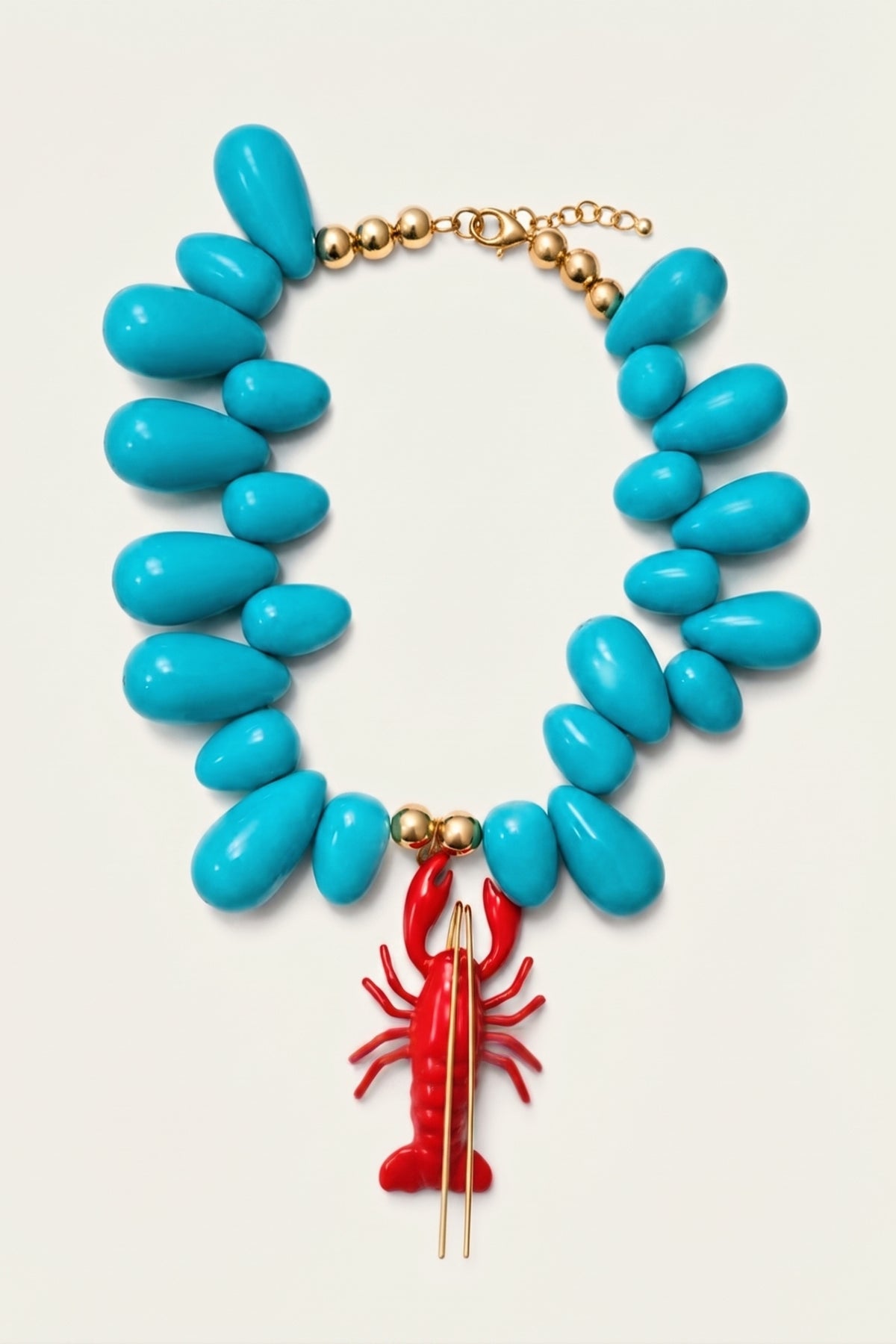 Lobster Kitsch & Sea Resin Bead Necklace on a cream background