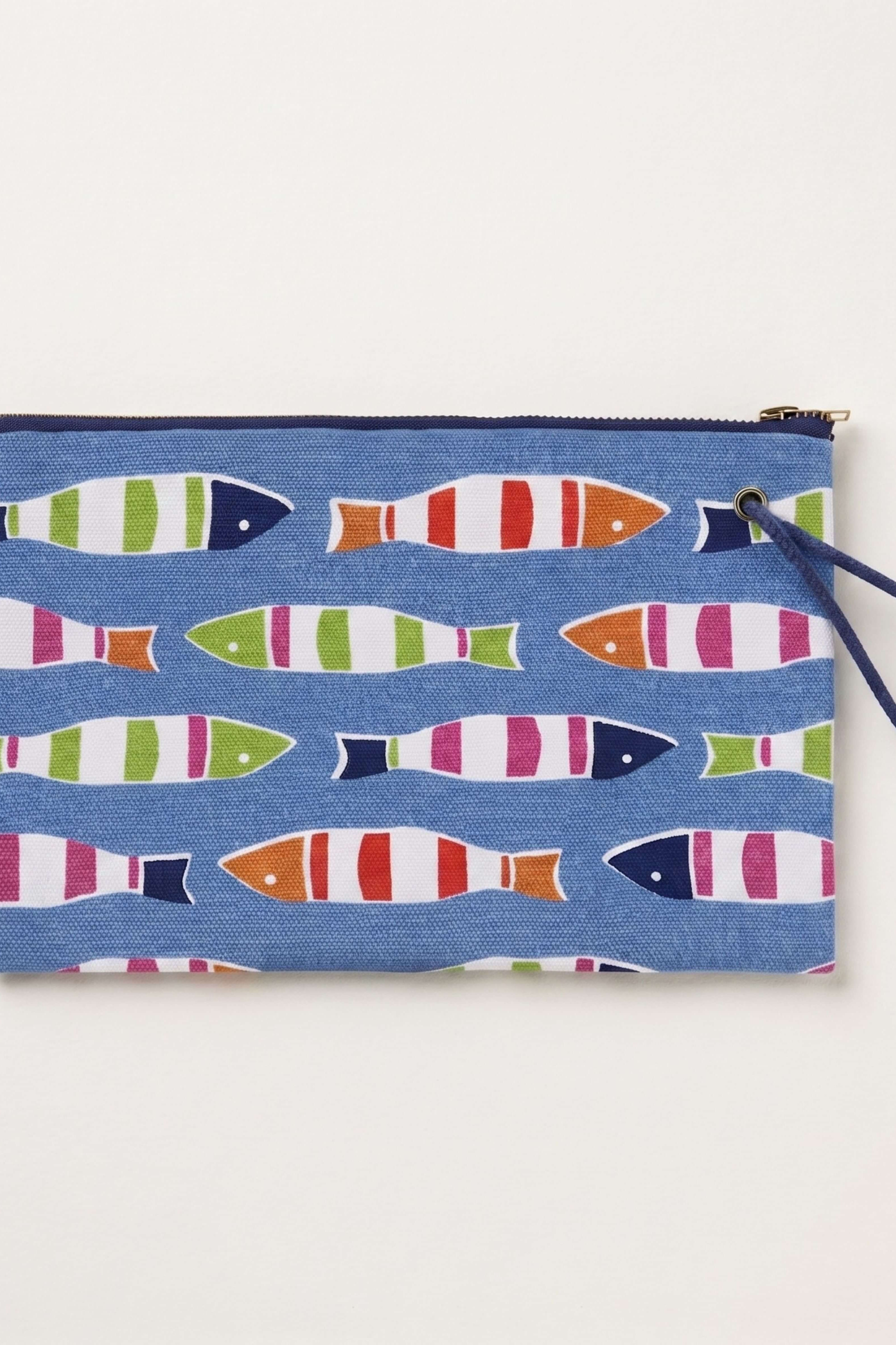 A rectangular blue pouch with a colorful fish pattern, featuring a zipper closure and a dark blue wrist strap, shown against a plain off-white background.
