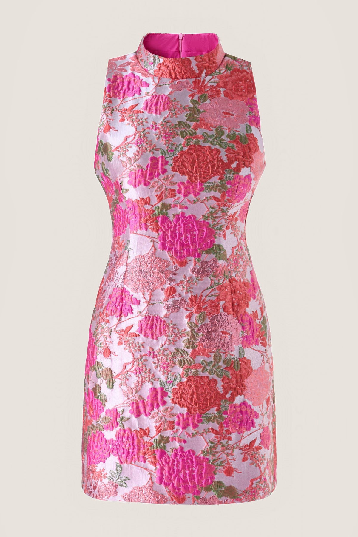 The Garden Party Dress shown on its own from the front: a sleeveless mock-neck mini in pink embossed floral jacquard with red and hot pink roses and green leaves, on a warm neutral background.